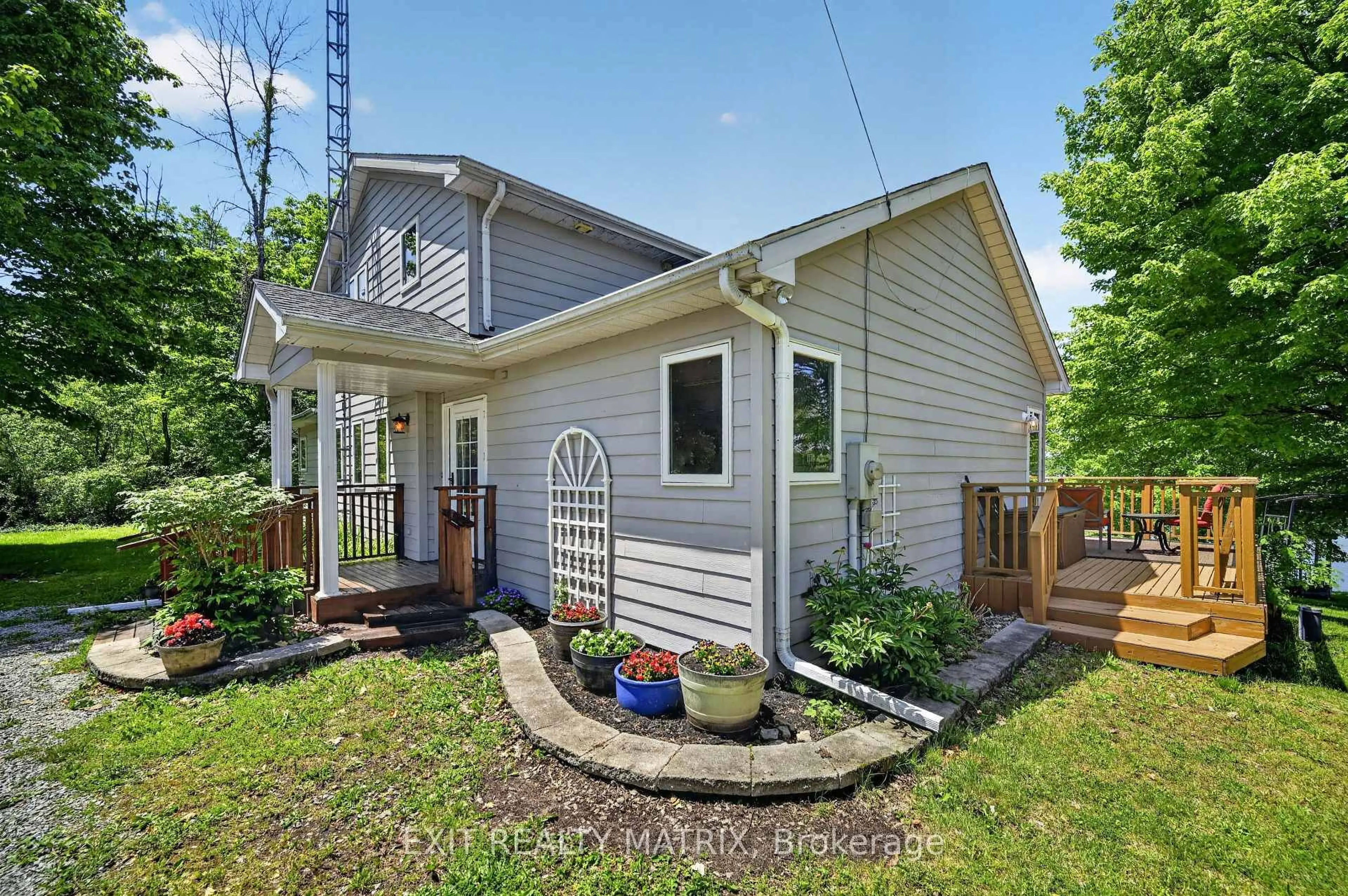 Home with vinyl exterior material, street for 30 Cory Dr, Front of Yonge Ontario K0E 1R0