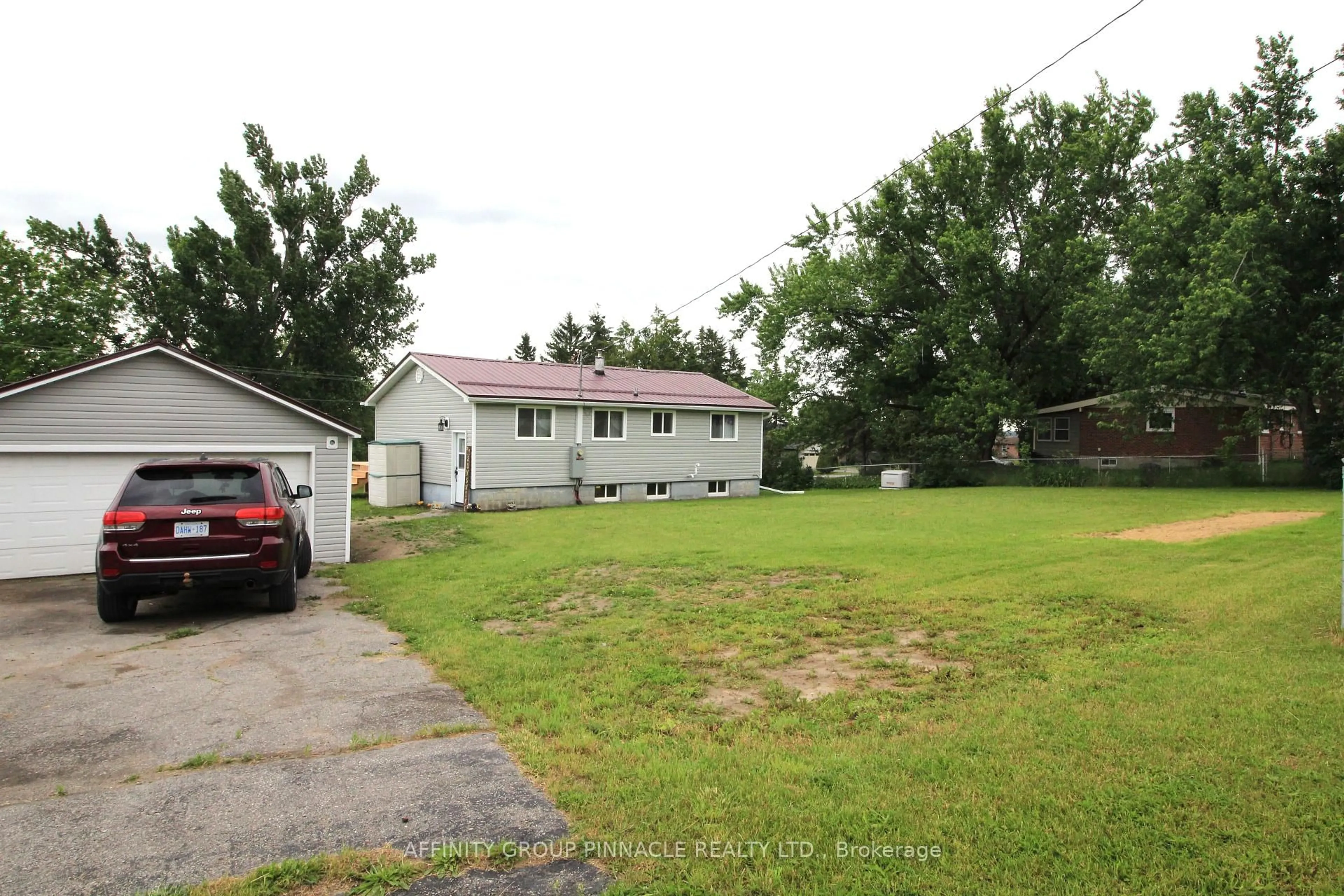 A pic from outside/outdoor area/front of a property/back of a property/a pic from drone, street for 105 Victoria Dr, Kawartha Lakes Ontario K0M 1G0