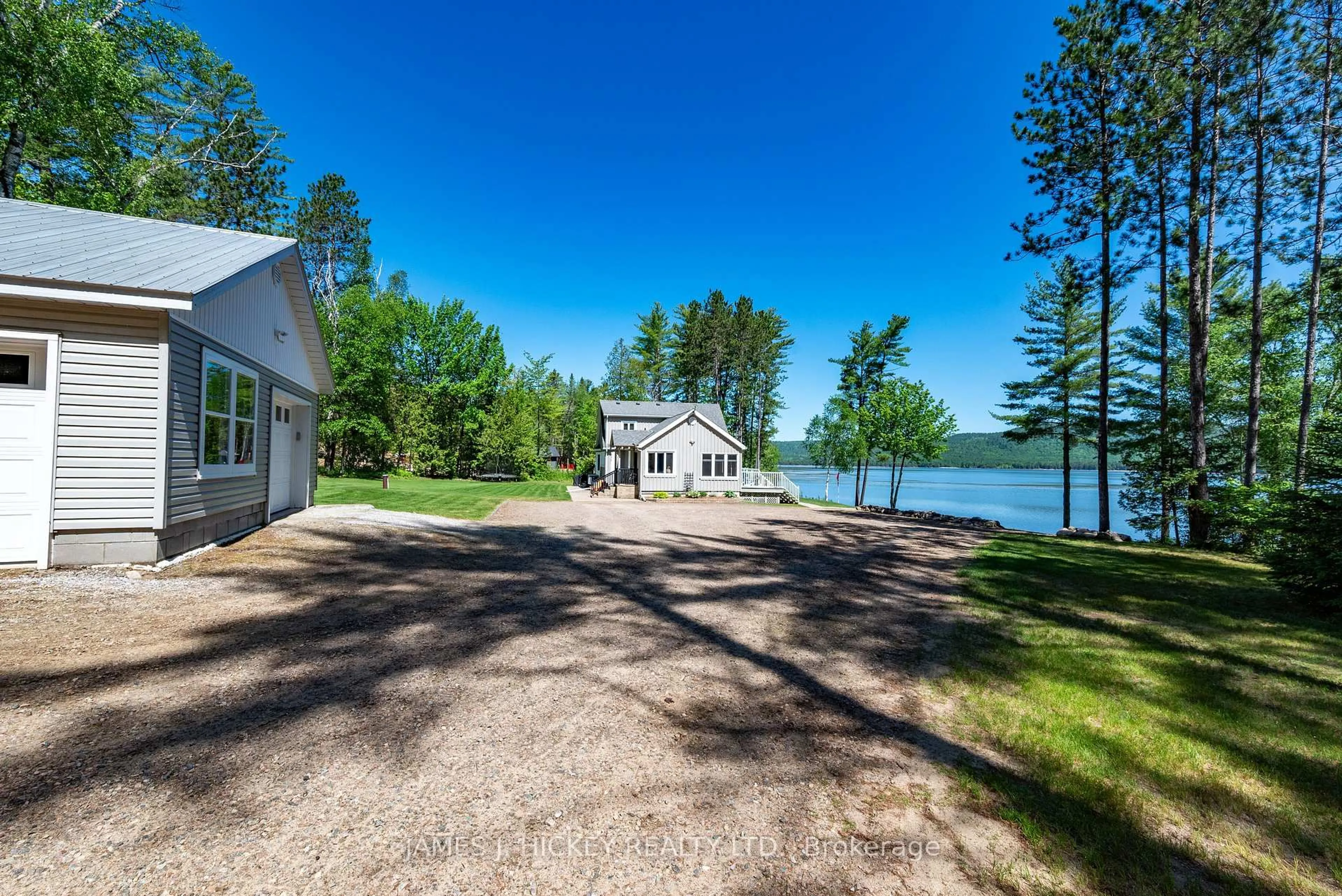 A pic from outside/outdoor area/front of a property/back of a property/a pic from drone, water/lake/river/ocean view for 141 Ezylyfe Lane, Deep River Ontario K0J 1P0
