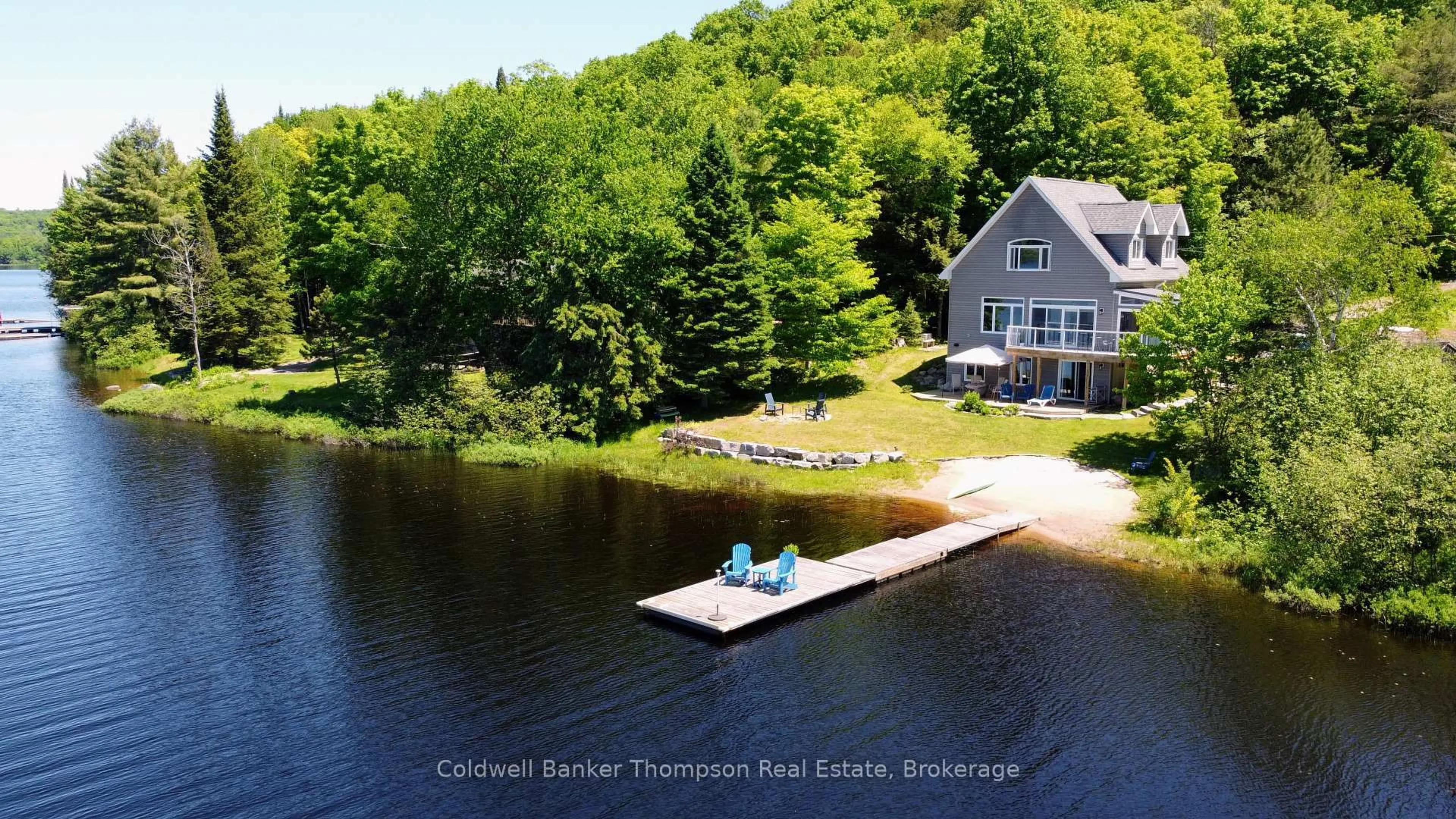A pic from outside/outdoor area/front of a property/back of a property/a pic from drone, water/lake/river/ocean view for 1132 Stanley Rd, Bracebridge Ontario P0B 1L0