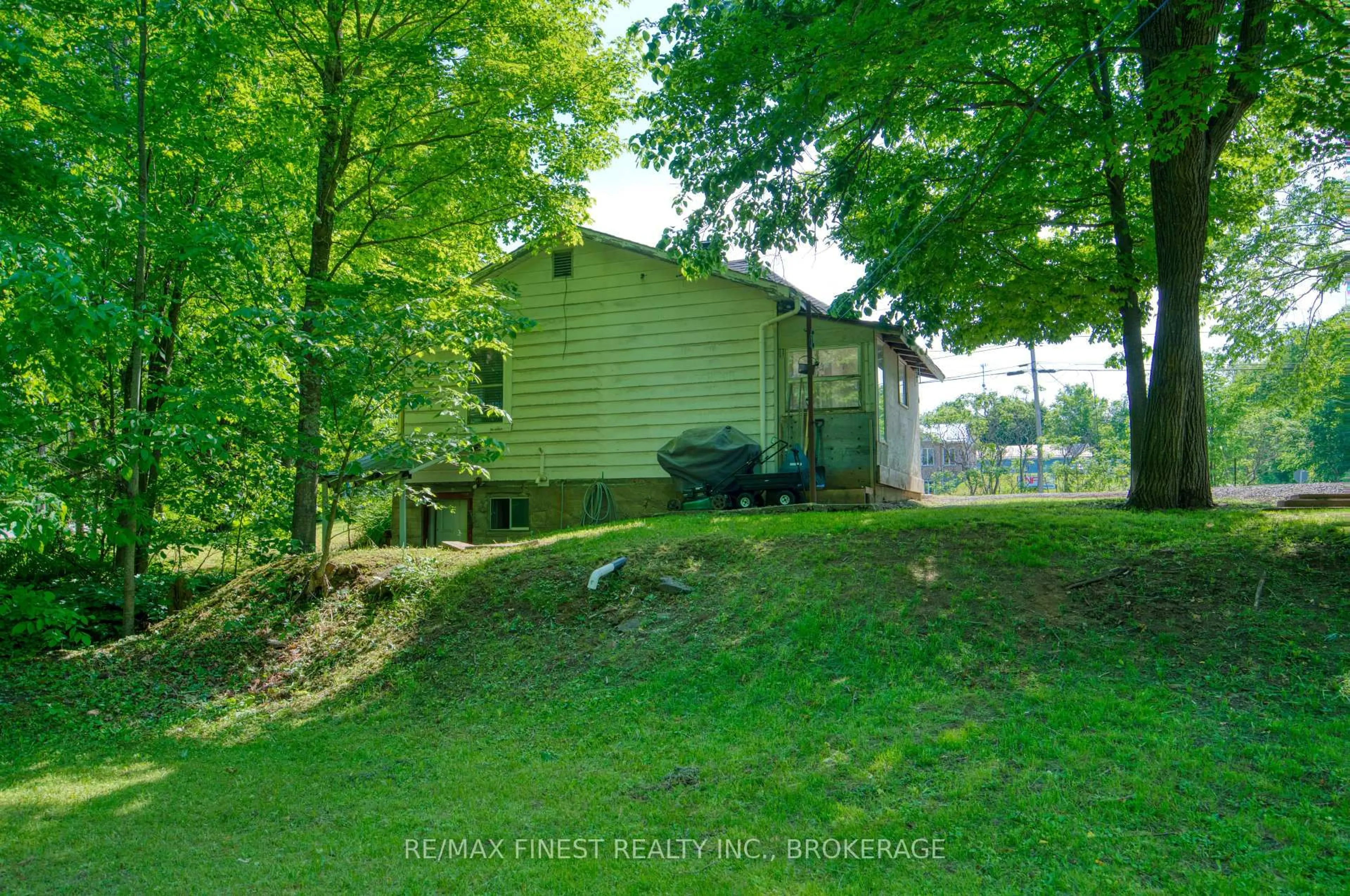 A pic from outside/outdoor area/front of a property/back of a property/a pic from drone, forest/trees view for 14818 County Road 38, Sharbot Lake Ontario K0H 2P0