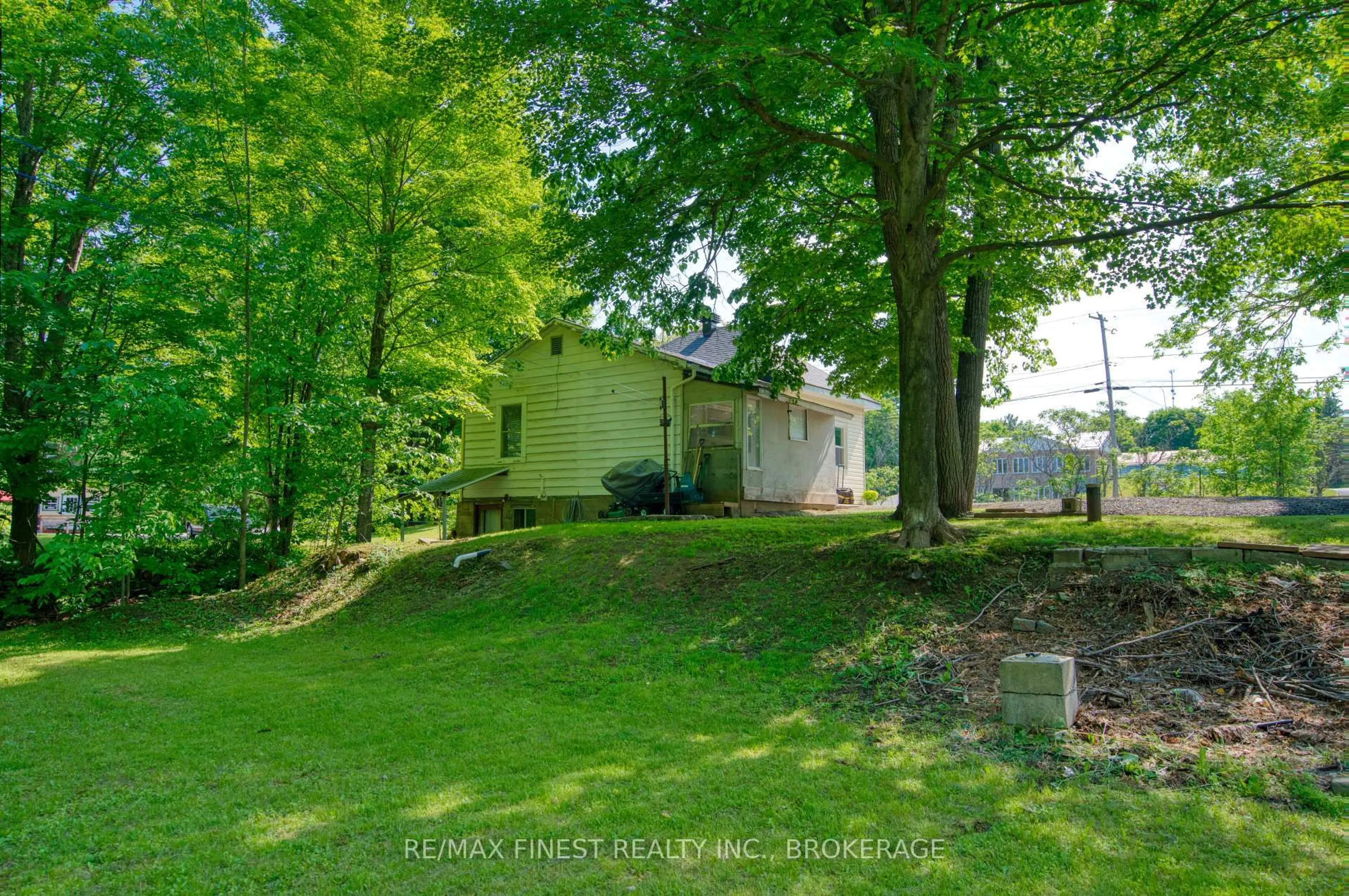 A pic from outside/outdoor area/front of a property/back of a property/a pic from drone, forest/trees view for 14818 County Road 38, Sharbot Lake Ontario K0H 2P0