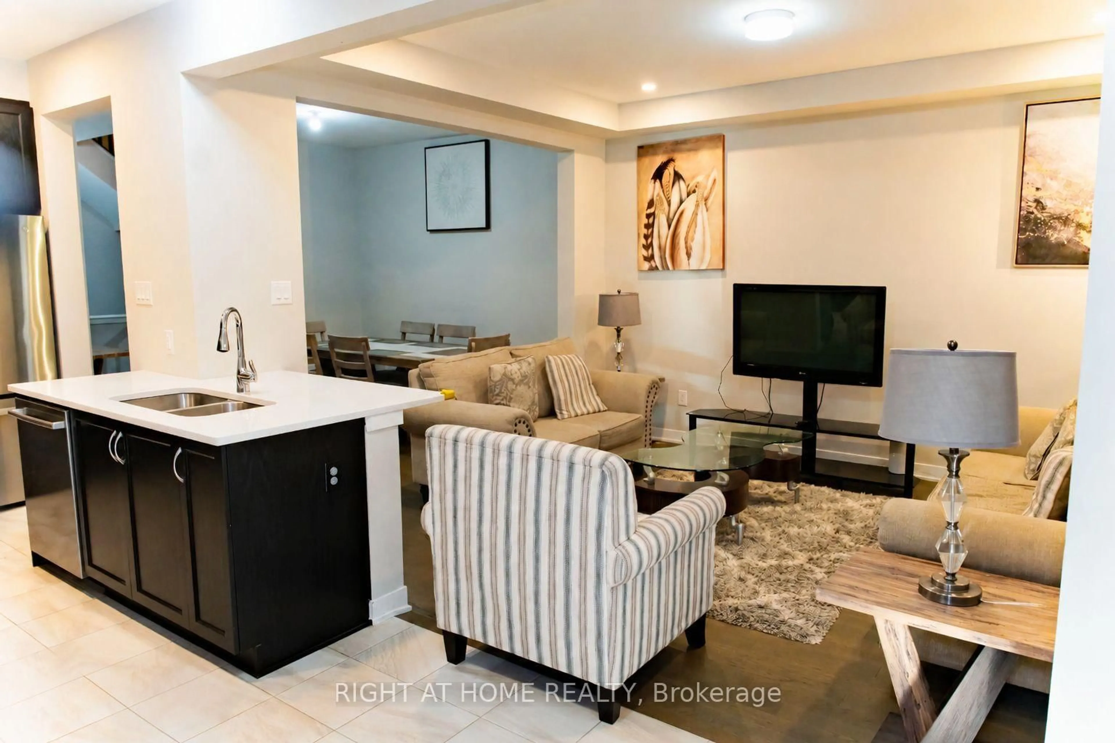 Living room with furniture, ceramic/tile floor for 76 Kindred Row, Ottawa Ontario K2S 3A2