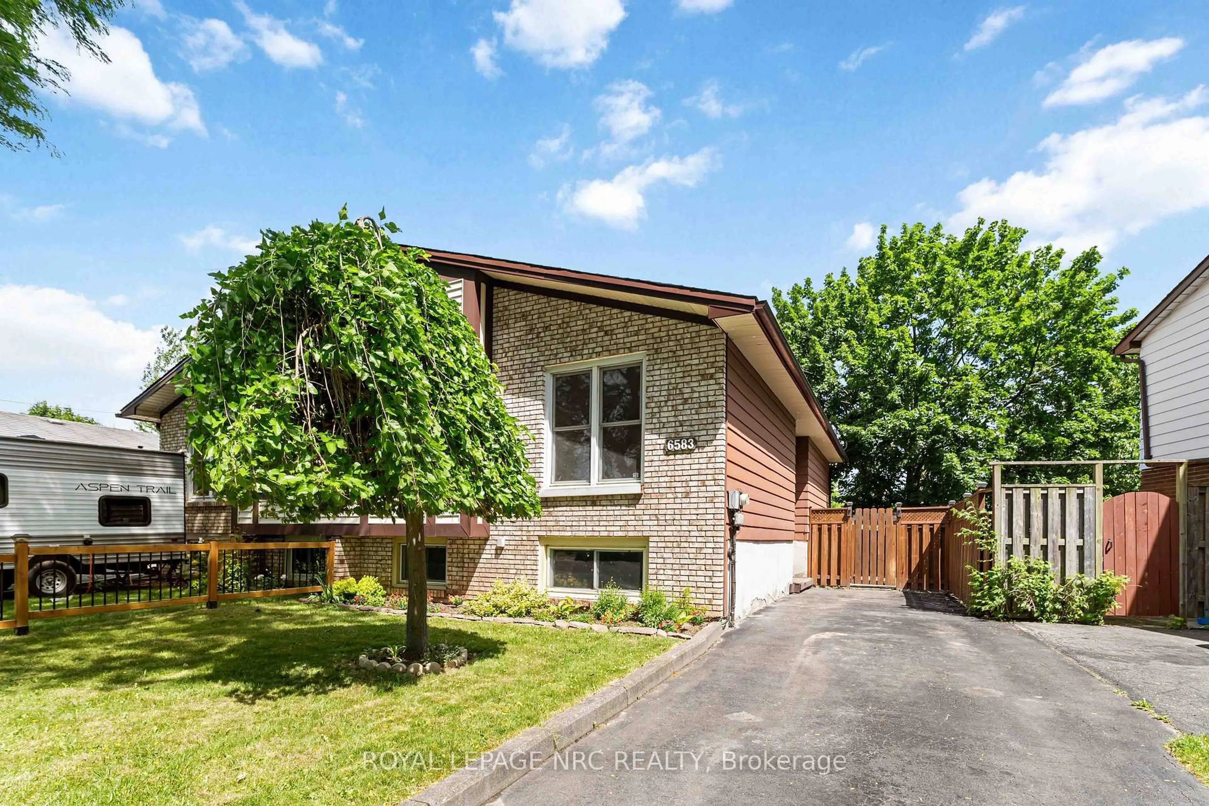 Home with brick exterior material, street for 6583 Harmony Ave, Niagara Falls Ontario L2H 1Z3
