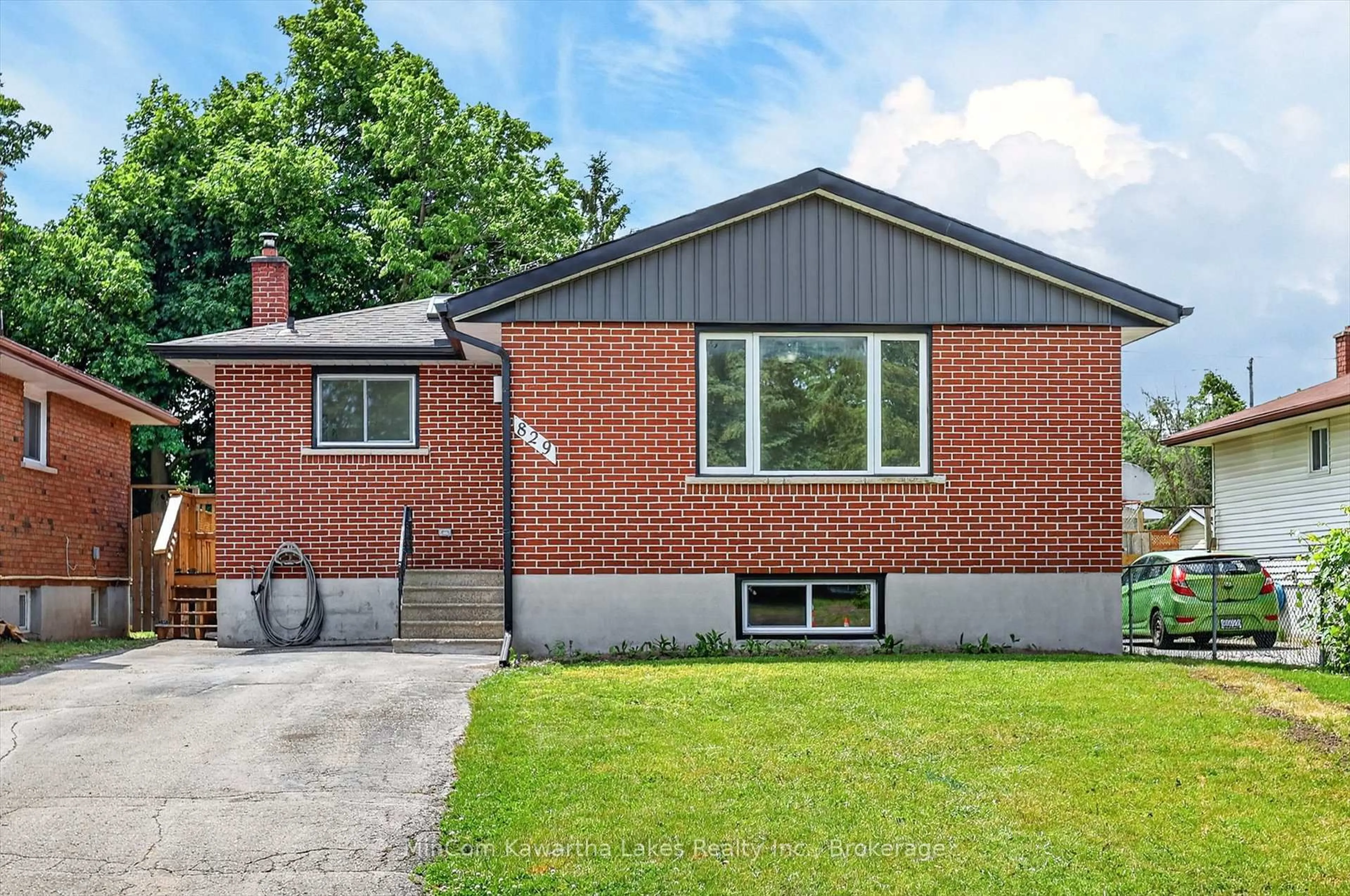 Home with brick exterior material, street for 829 Orpington Rd, Peterborough Ontario K9J 4A6