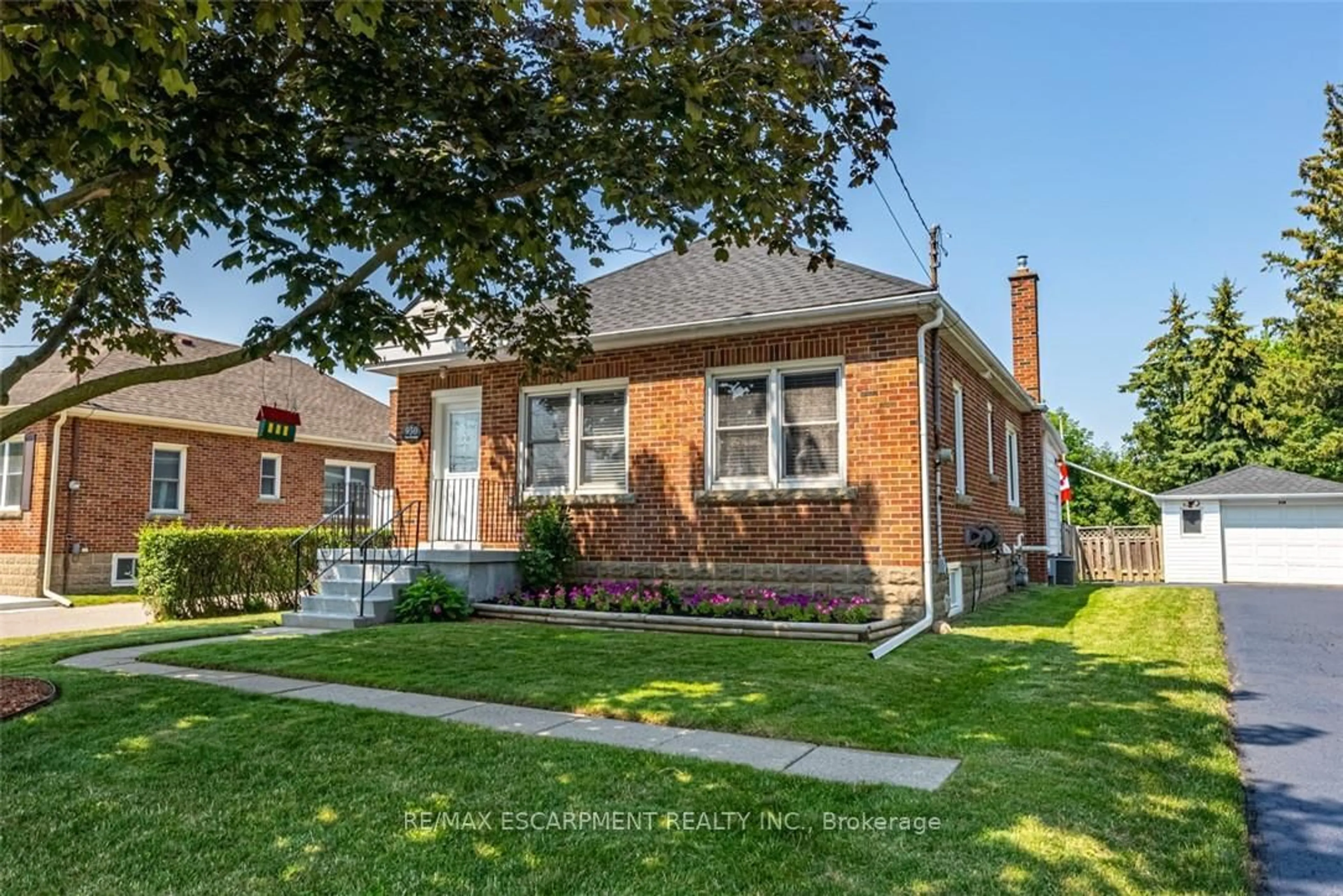 Home with brick exterior material, street for 930 West 5th St, Hamilton Ontario L9C 3R7