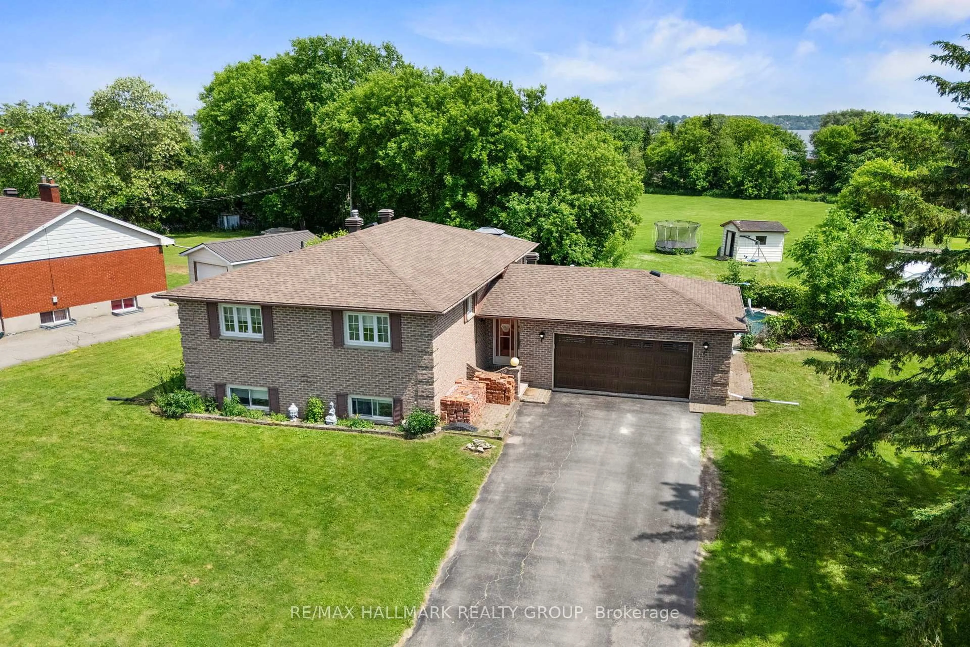 A pic from outside/outdoor area/front of a property/back of a property/a pic from drone, water/lake/river/ocean view for 17 Sunnymede Ave, Prescott Ontario K0E 1T0