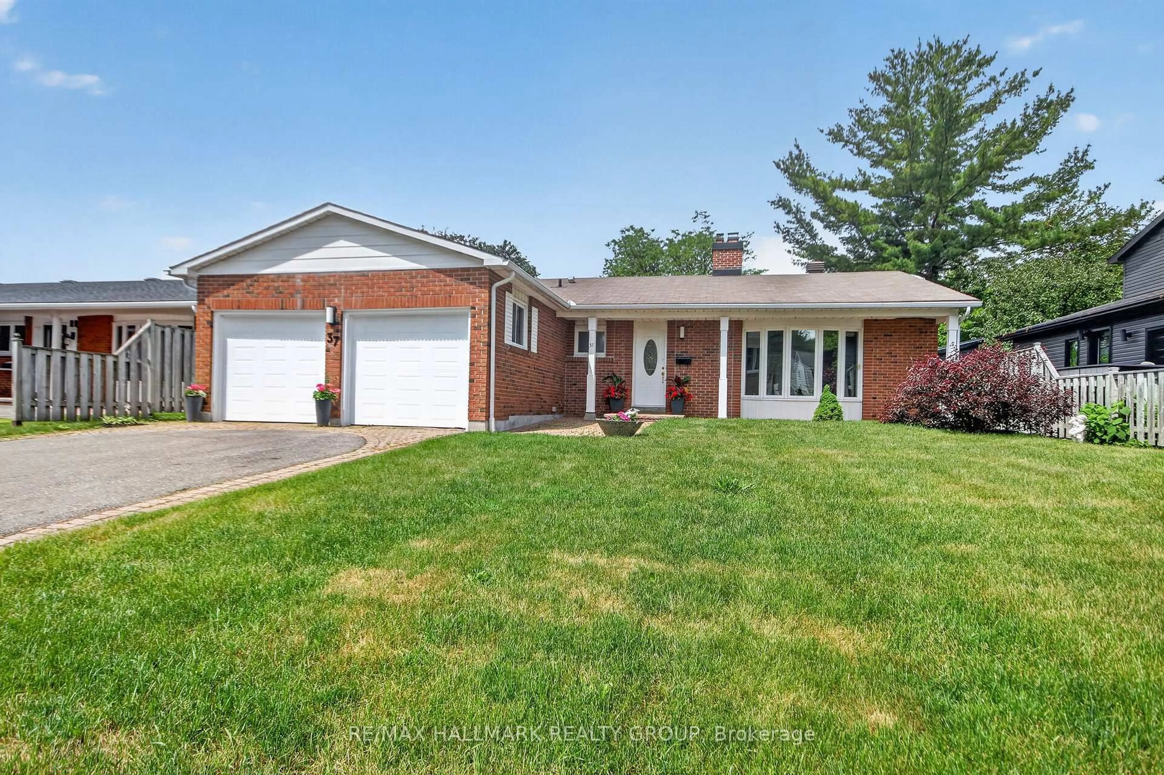 Home with brick exterior material, street for 37 Parkwood Cres, Ottawa Ontario K1B 3J5