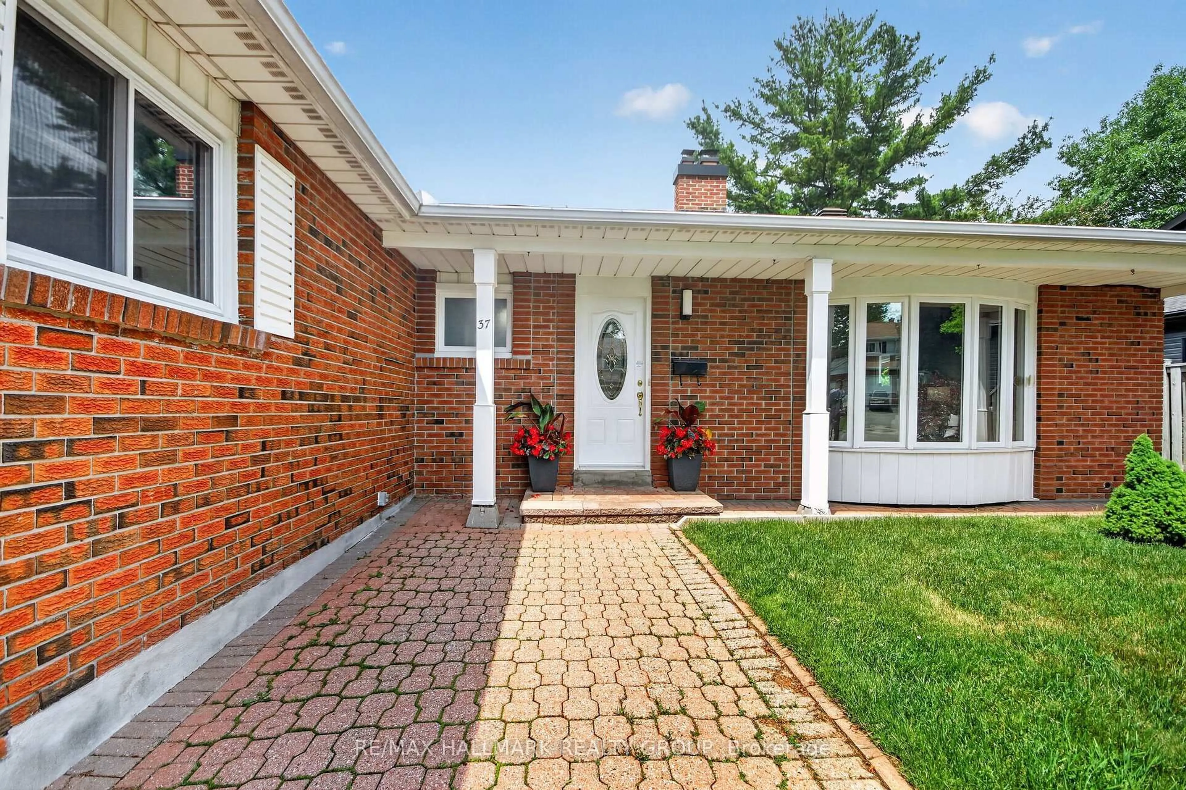 Home with brick exterior material, street for 37 Parkwood Cres, Ottawa Ontario K1B 3J5