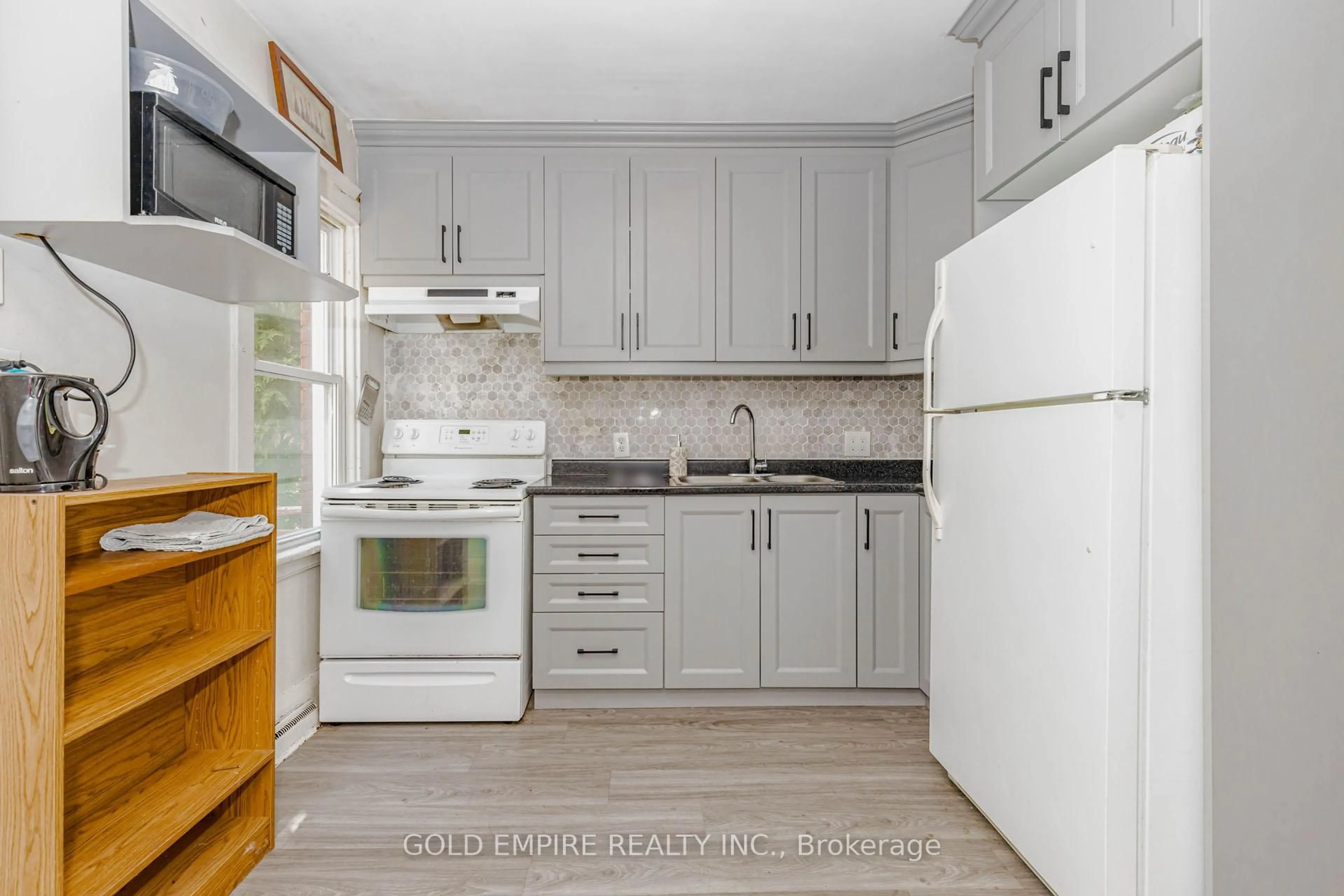 Standard kitchen, wood/laminate floor for 1177 King St, Hamilton Ontario L8S 1M3