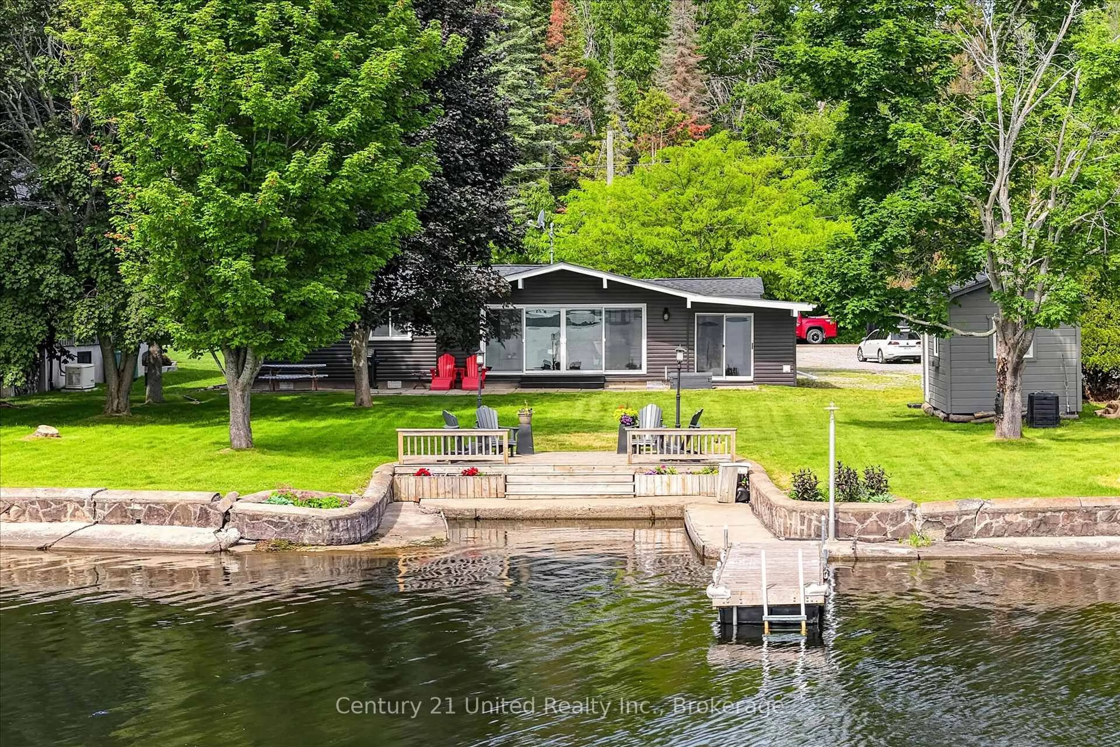 A pic from outside/outdoor area/front of a property/back of a property/a pic from drone, water/lake/river/ocean view for 1515 O'Connor Dr, Selwyn Ontario K0L 1T0