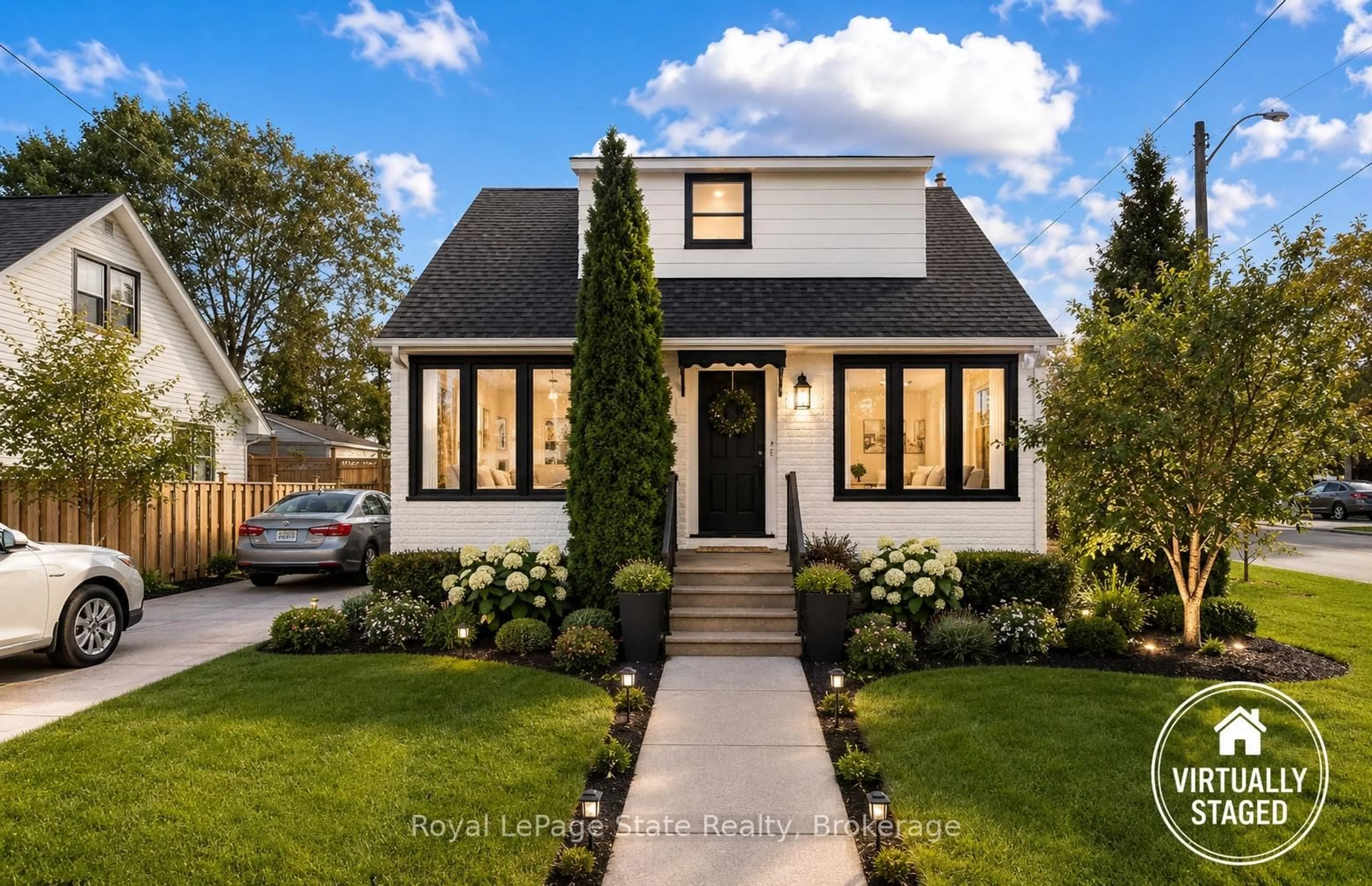 Home with brick exterior material, street for 15 West 1st St, Hamilton Ontario L9C 3B5