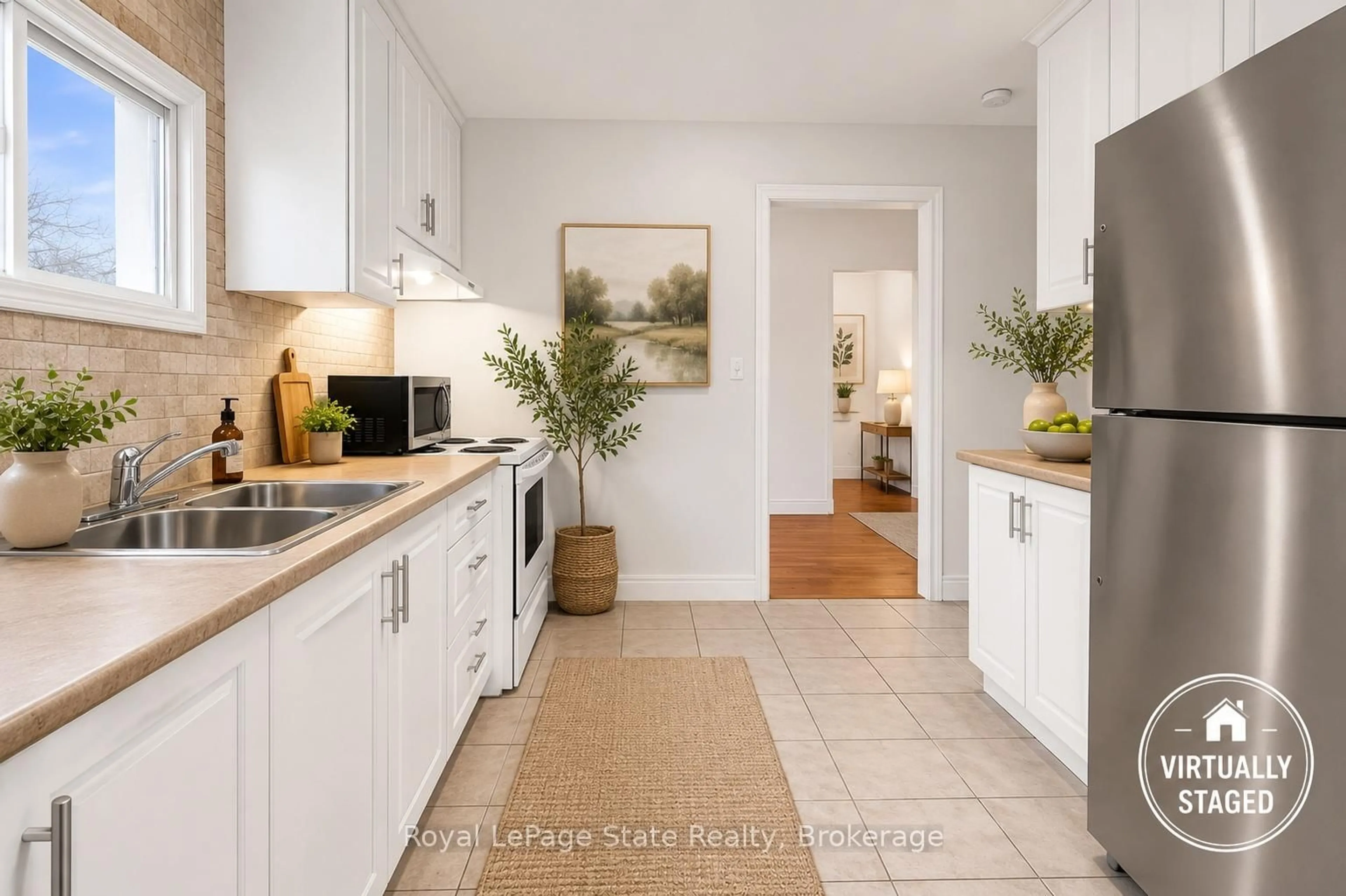 Open concept kitchen, ceramic/tile floor for 15 West 1st St, Hamilton Ontario L9C 3B5