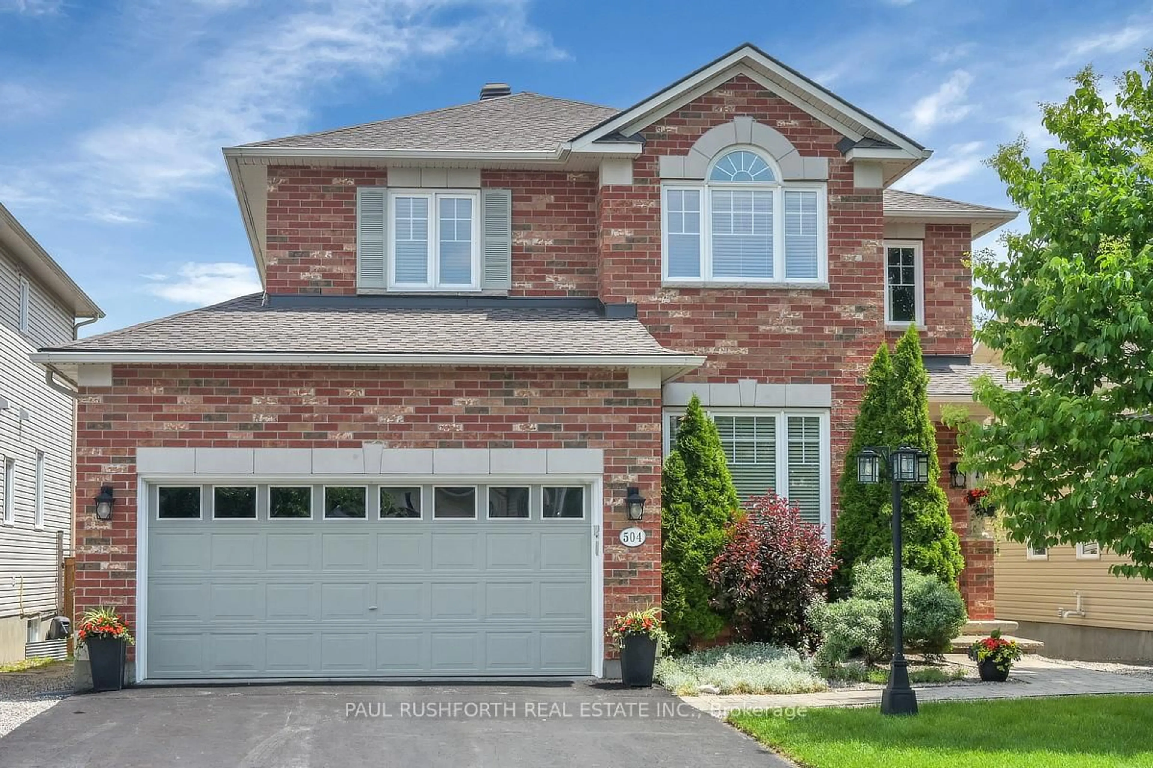 Home with brick exterior material, street for 504 Landswood Way, Ottawa Ontario K2S 0A5