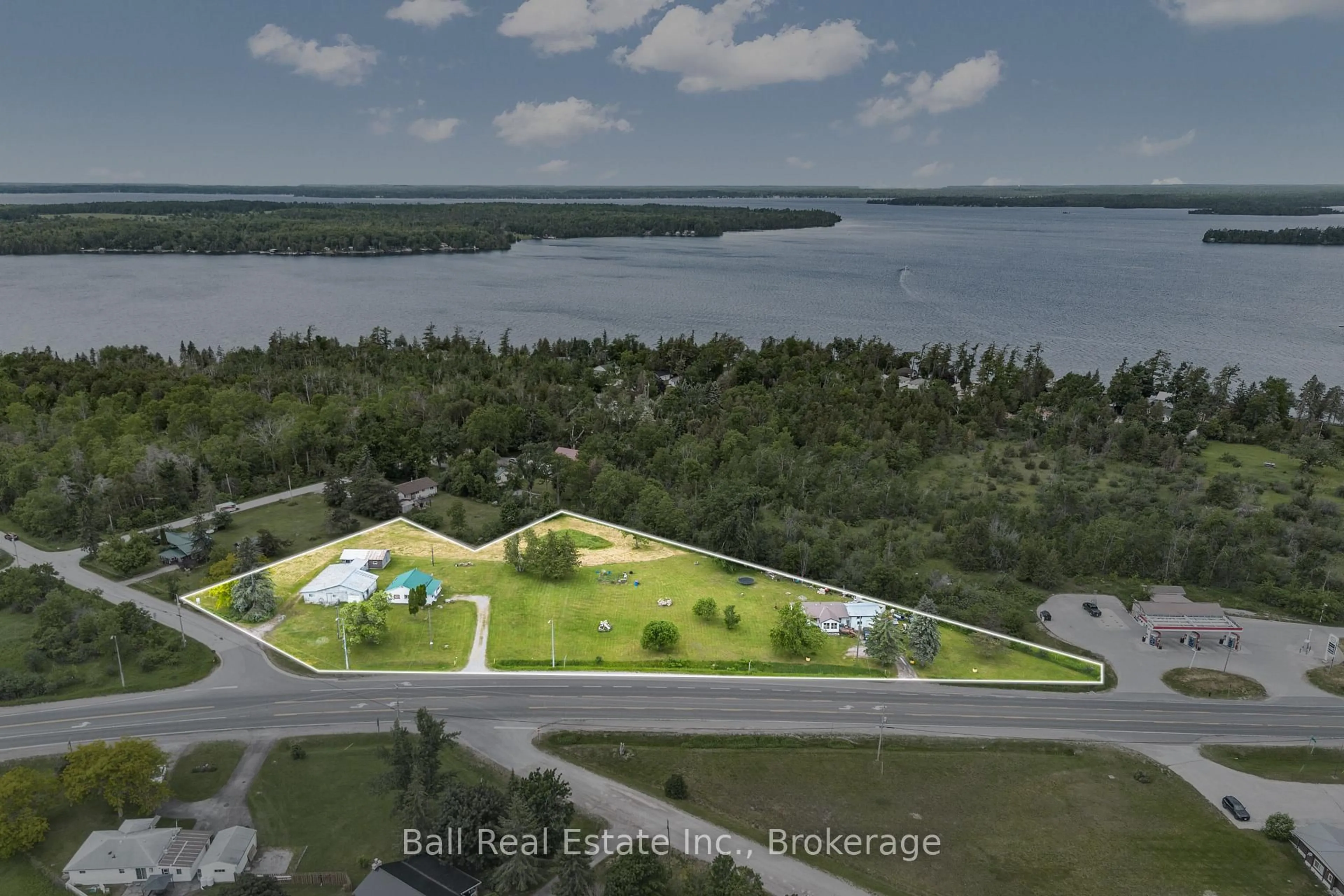 A pic from outside/outdoor area/front of a property/back of a property/a pic from drone, water/lake/river/ocean view for 5641 Highway 35, Kawartha Lakes Ontario K0M 1N0