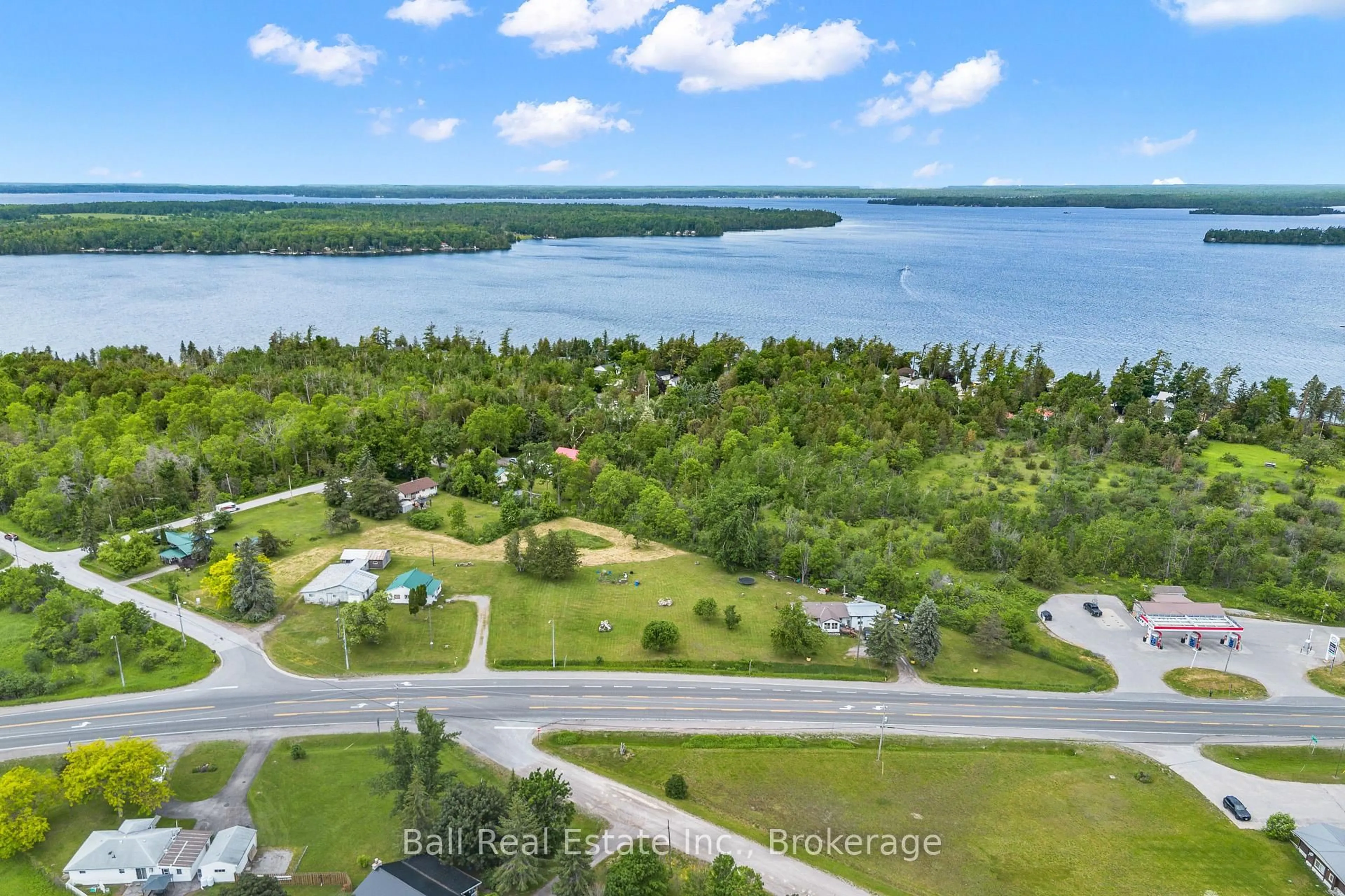 A pic from outside/outdoor area/front of a property/back of a property/a pic from drone, water/lake/river/ocean view for 5641 Highway 35, Kawartha Lakes Ontario K0M 1N0