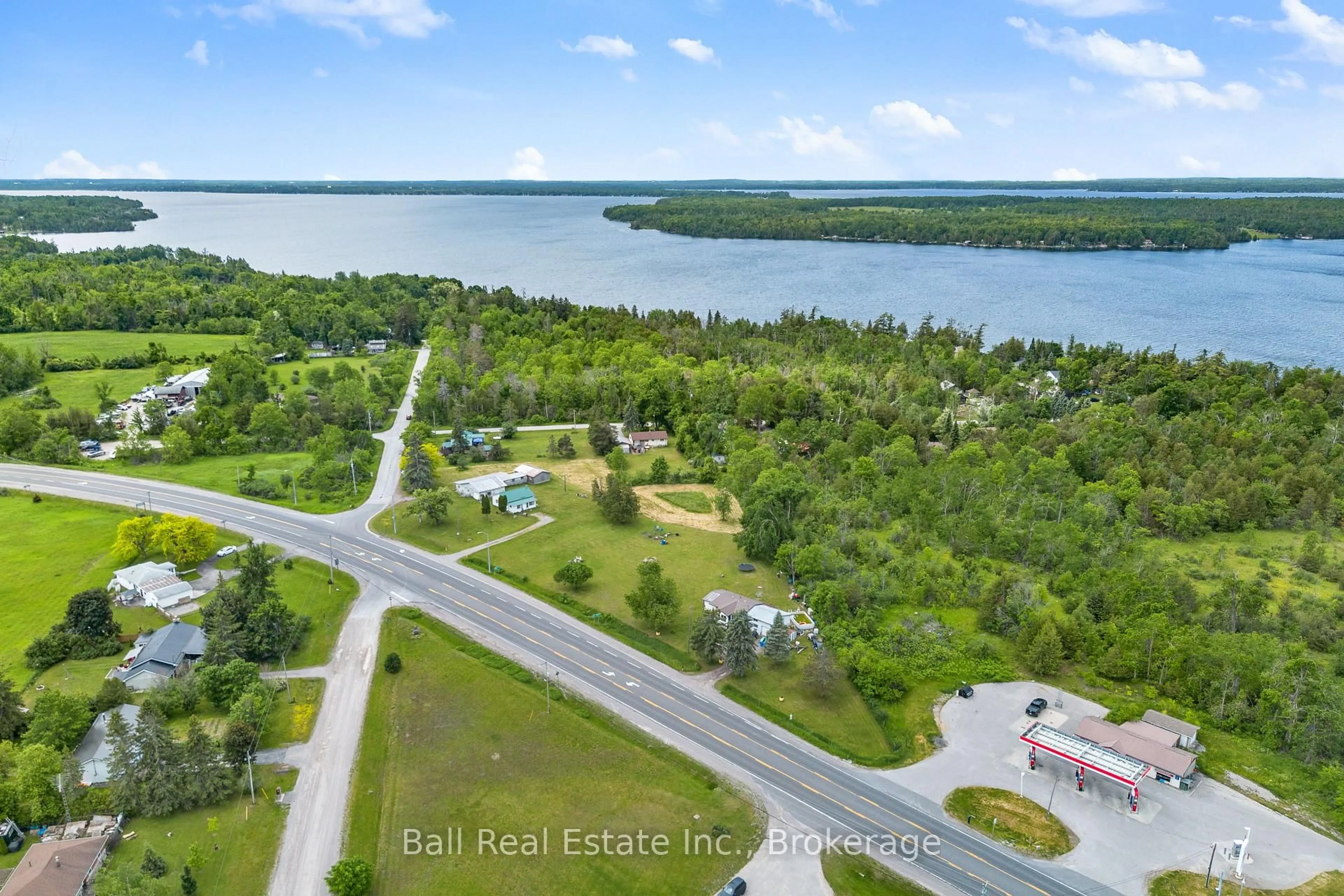 A pic from outside/outdoor area/front of a property/back of a property/a pic from drone, water/lake/river/ocean view for 5641 Highway 35, Kawartha Lakes Ontario K0M 1N0