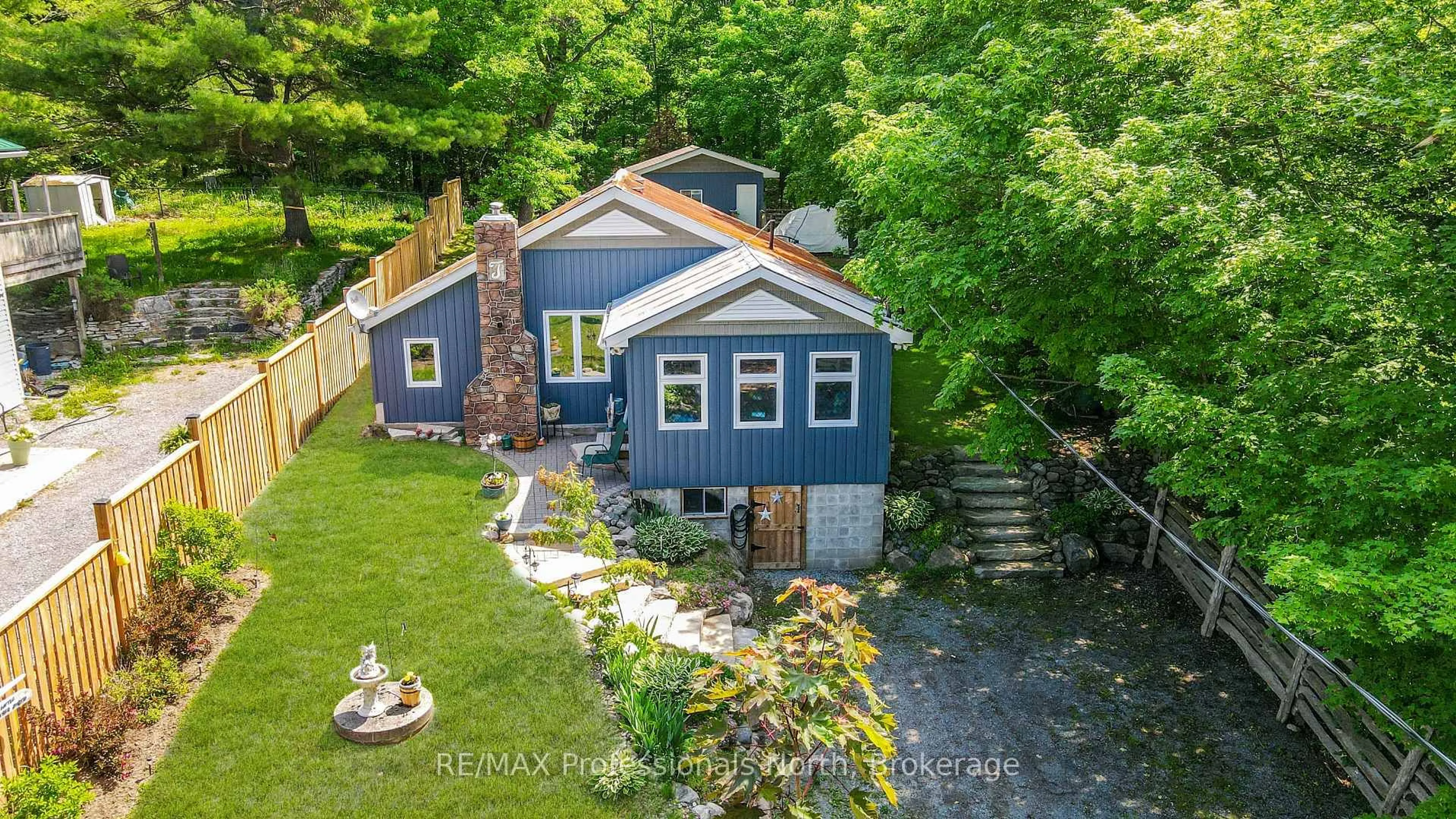 A pic from outside/outdoor area/front of a property/back of a property/a pic from drone, water/lake/river/ocean view for 203 Burleigh St, North Kawartha Ontario K0L 1A0