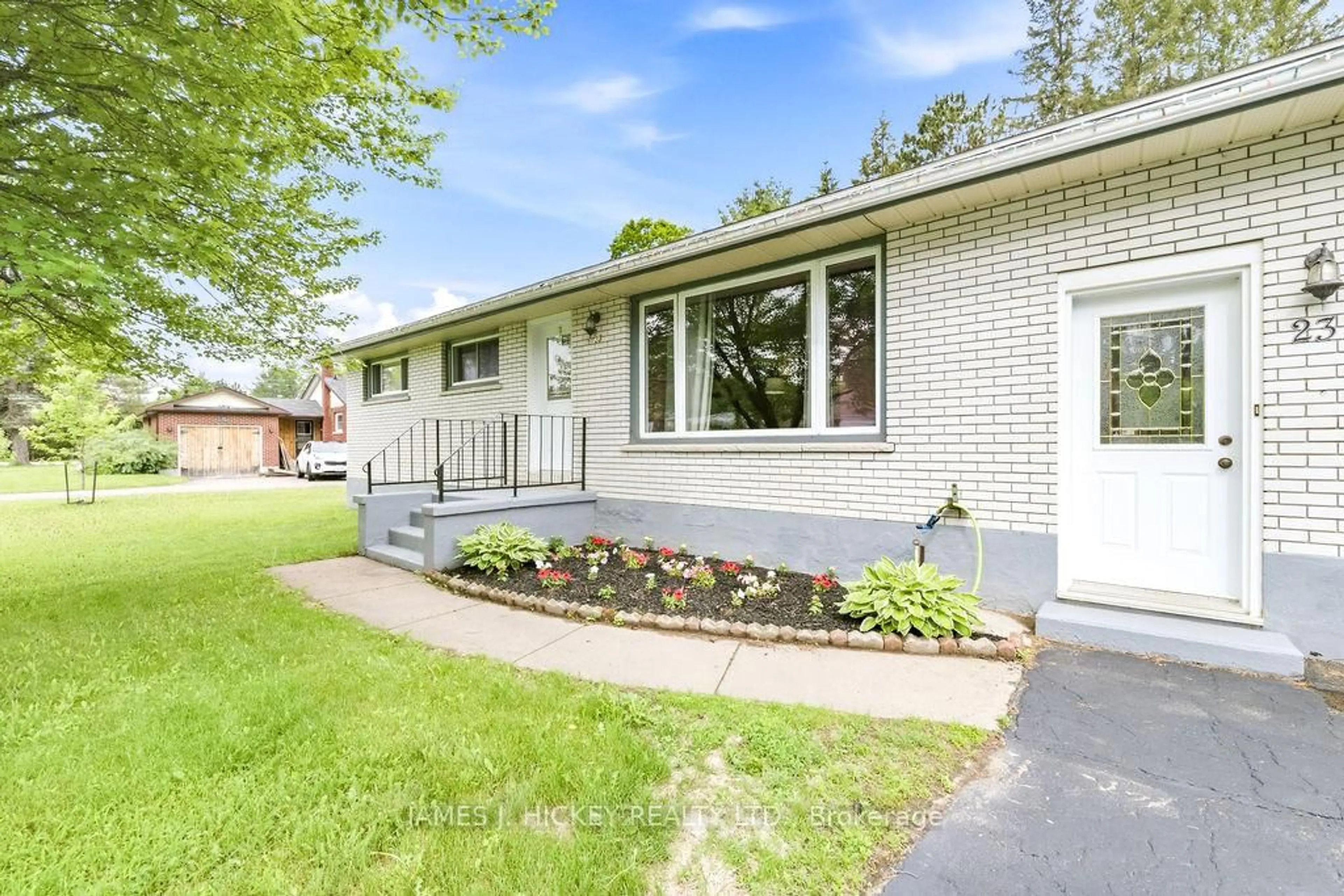 Home with vinyl exterior material, street for 23 Thomas St, Deep River Ontario K0J 1P0