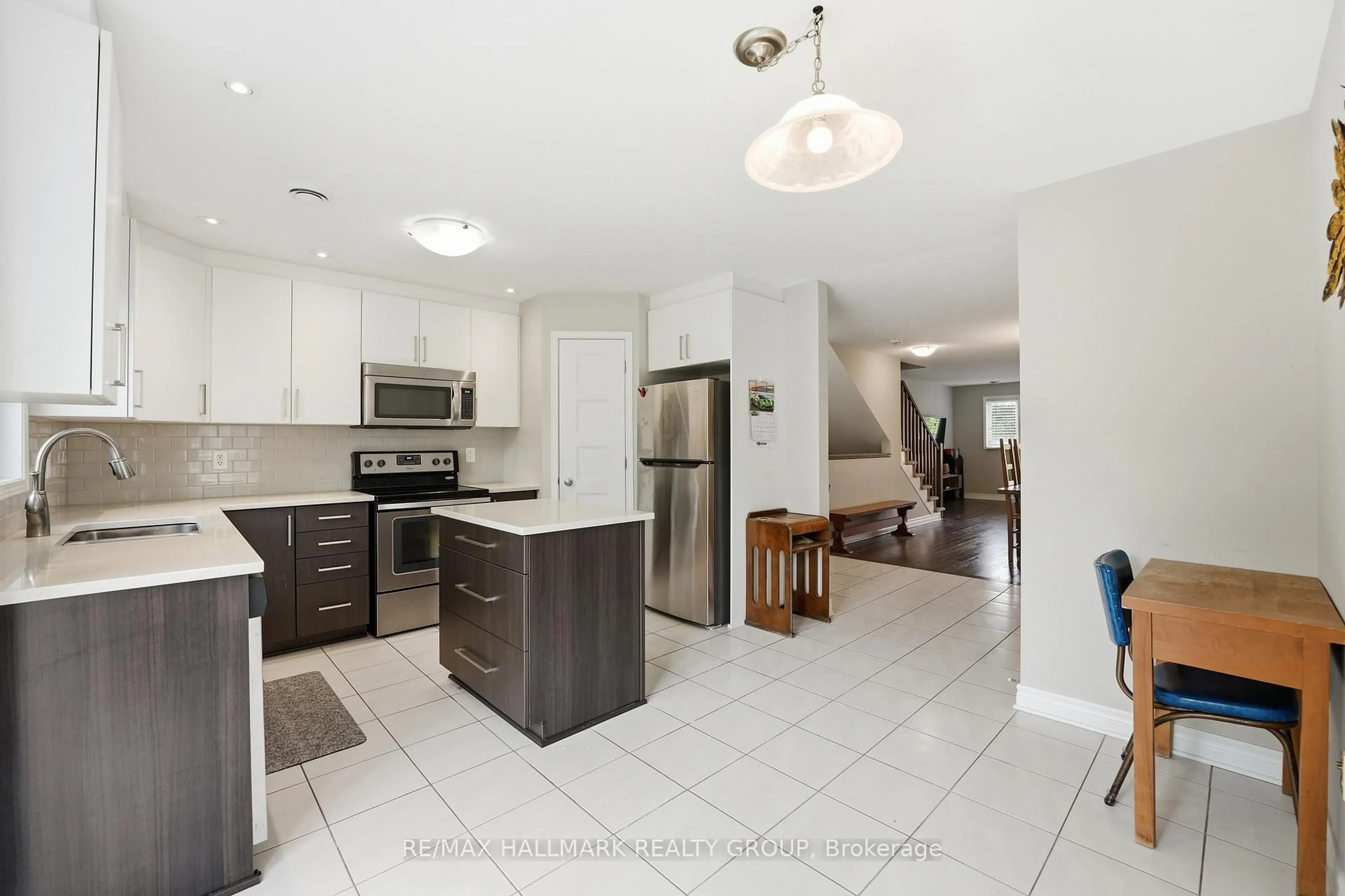 Open concept kitchen, ceramic/tile floor for 670 Danaca Private, Ottawa Ontario K1K 2V7