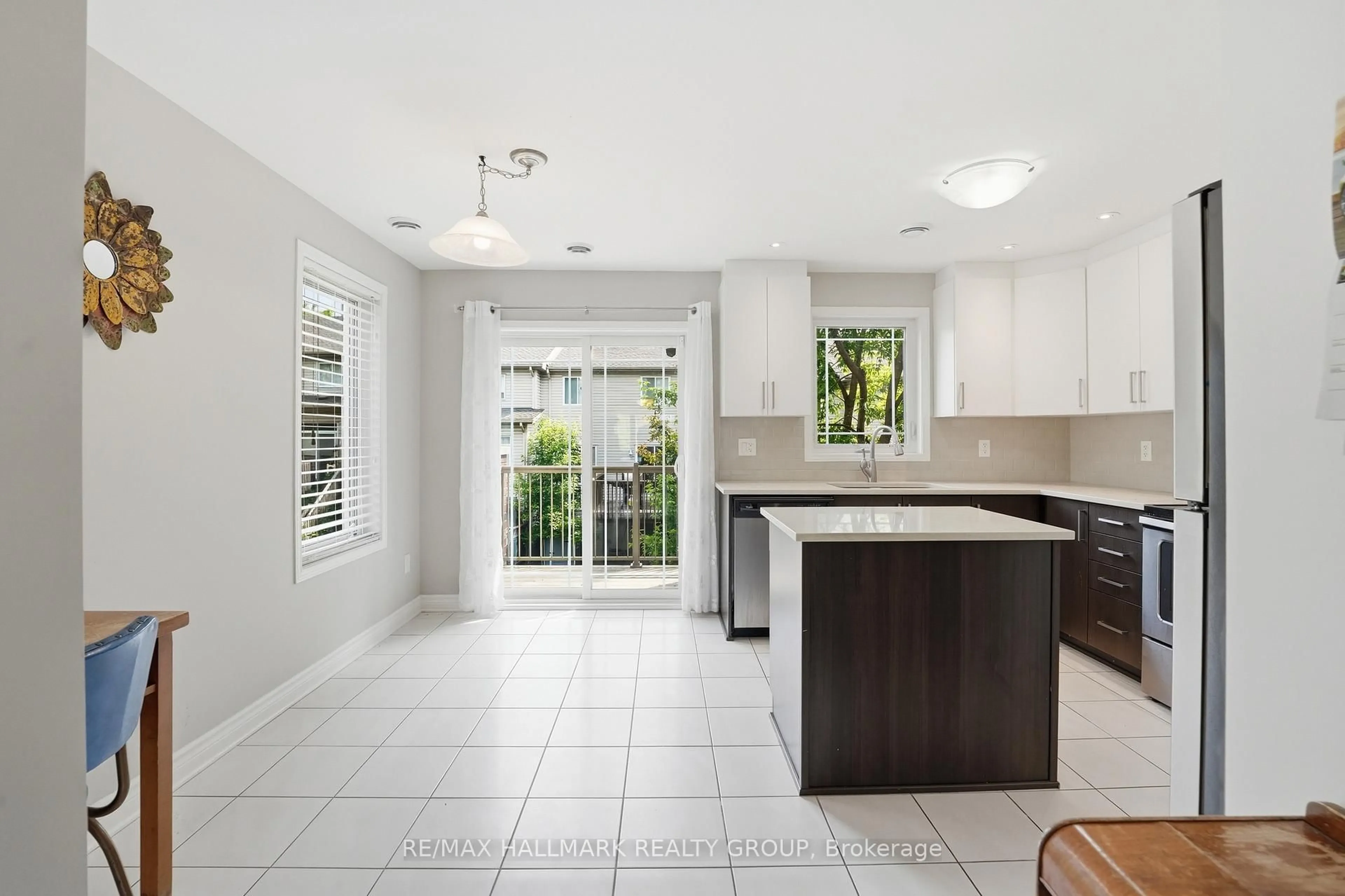 Open concept kitchen, ceramic/tile floor for 670 Danaca Private, Ottawa Ontario K1K 2V7