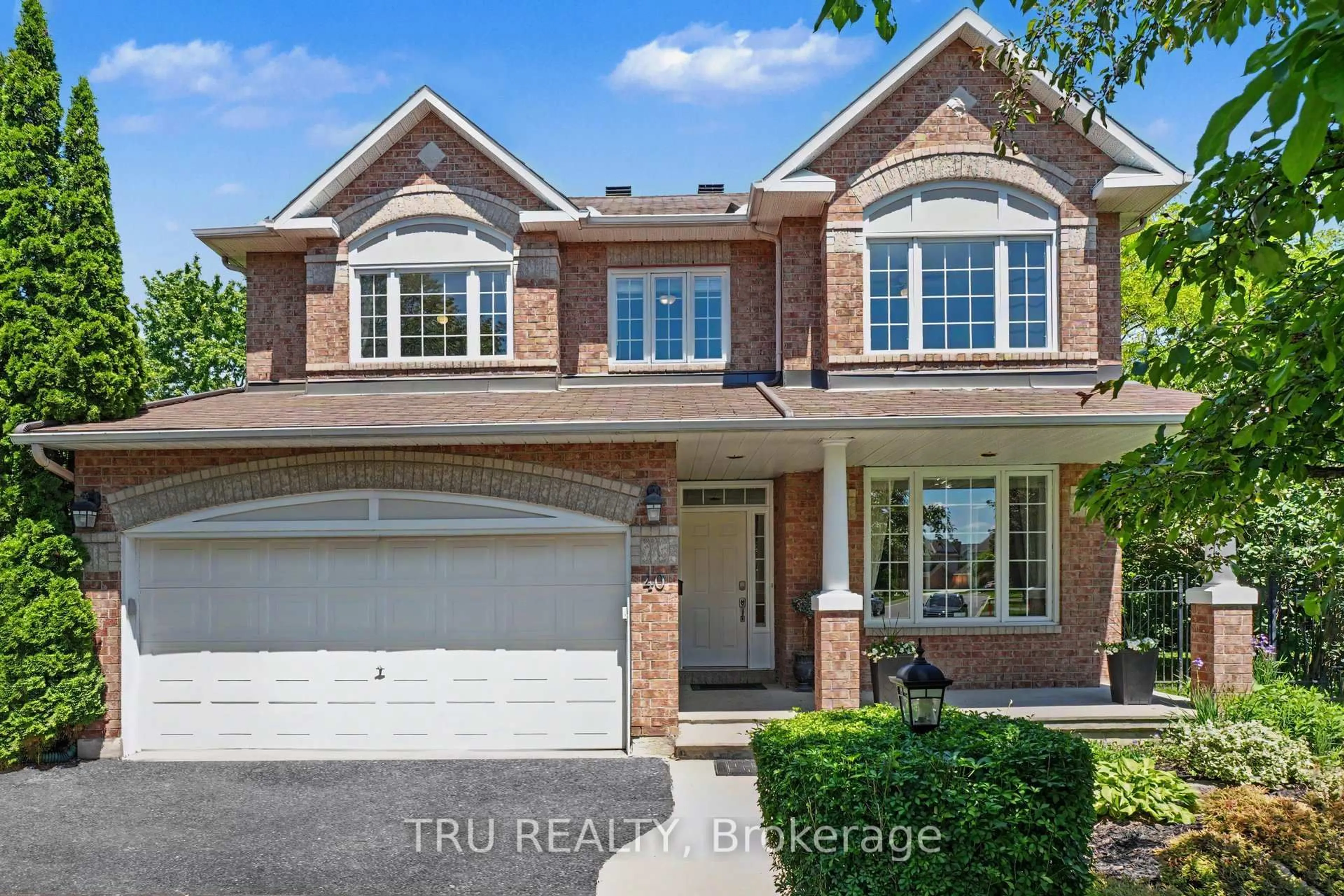 Home with brick exterior material, street for 40 Cimarron Cres, Ottawa Ontario K2G 6E1