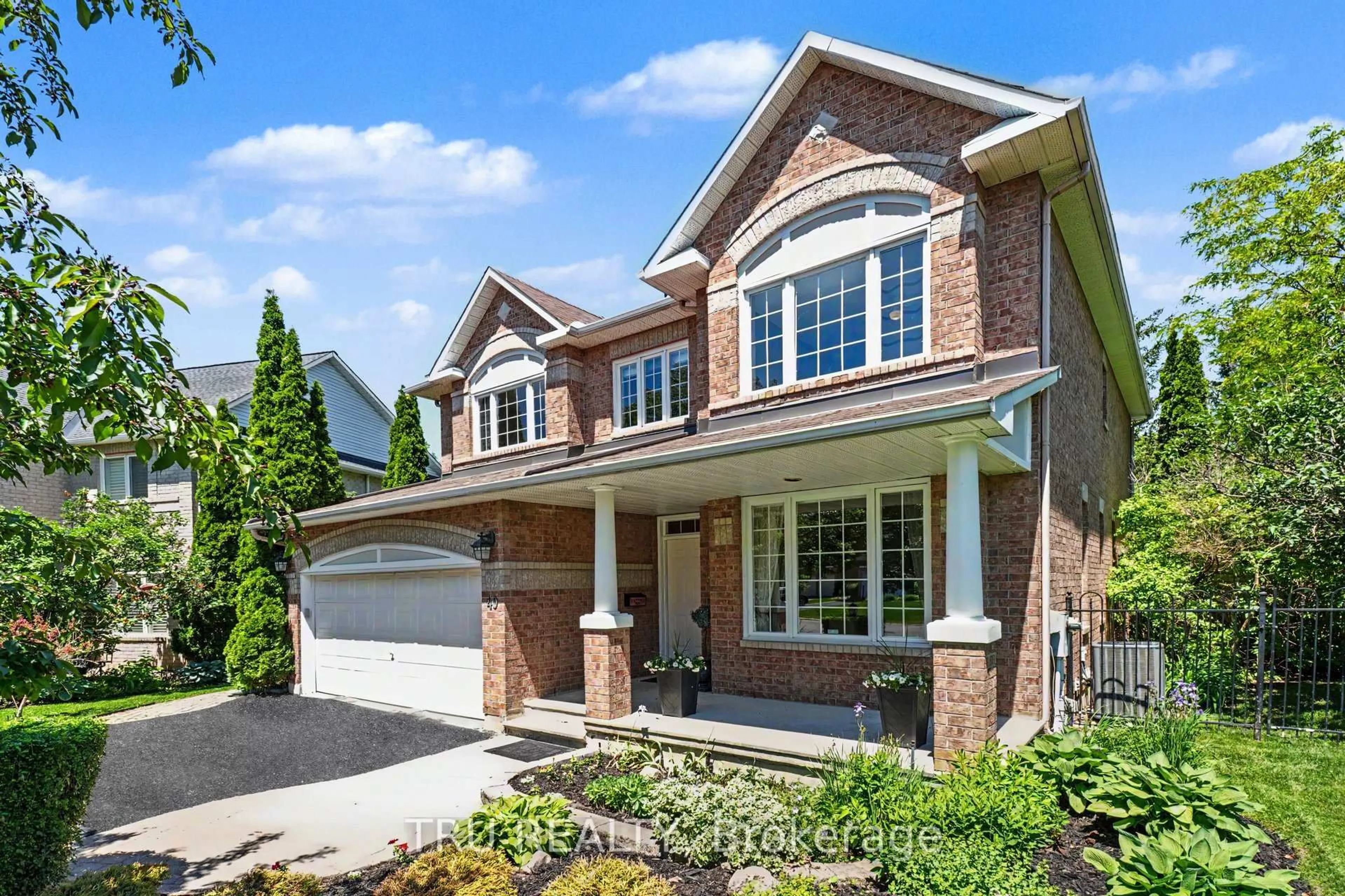 Home with brick exterior material, street for 40 Cimarron Cres, Ottawa Ontario K2G 6E1