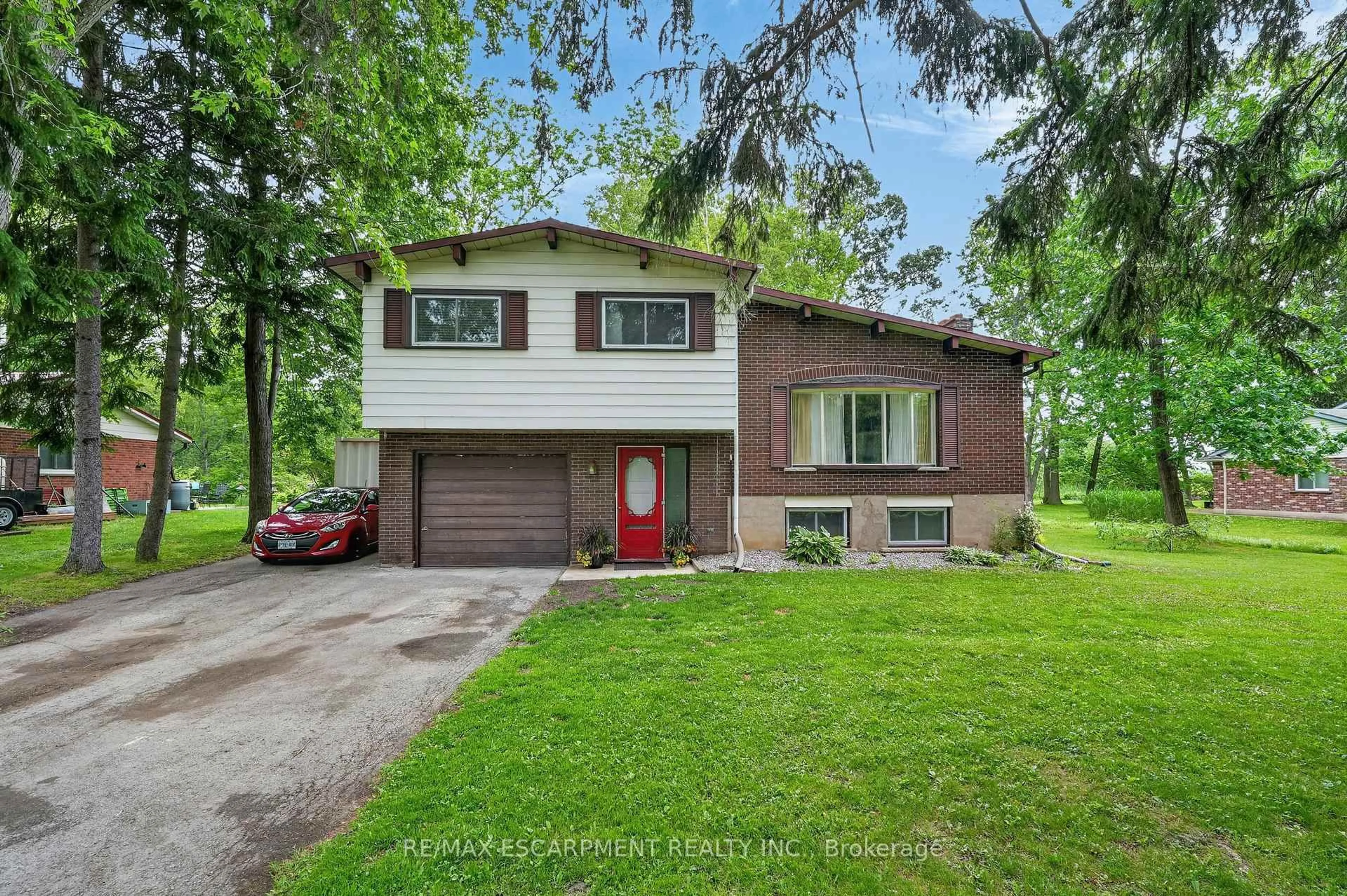 Home with vinyl exterior material, street for 124 Mumby Rd, Haldimand Ontario N1A 2W5