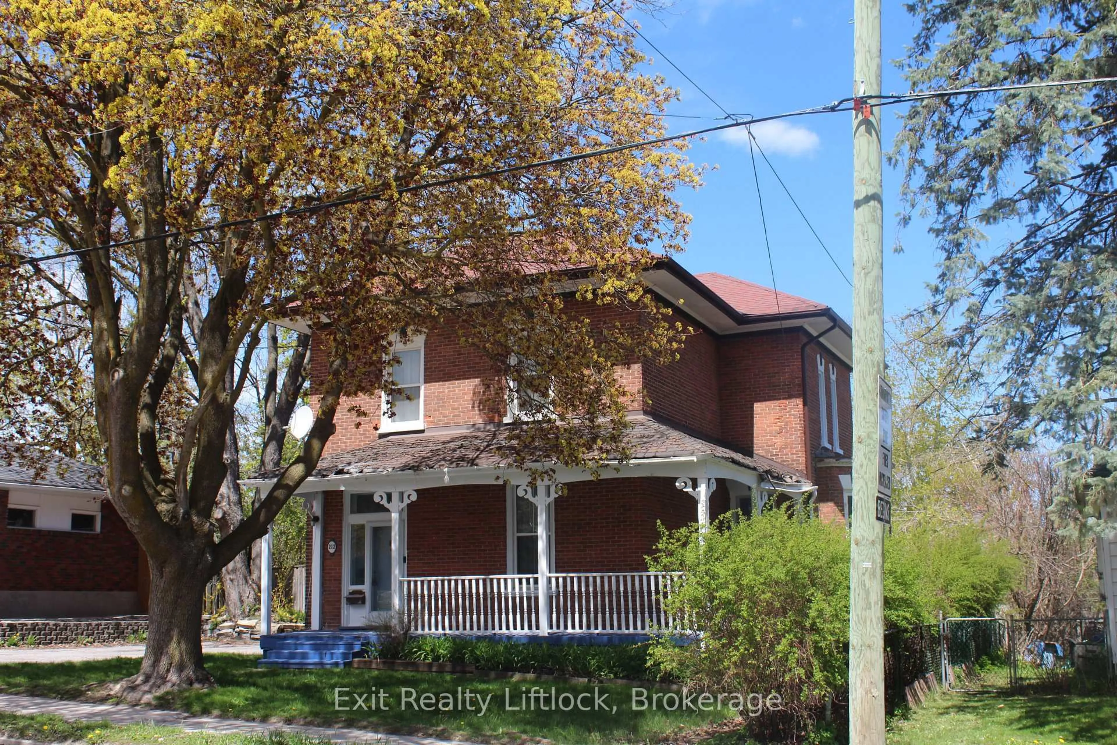 Home with brick exterior material, street for 212 Barnardo Ave, Peterborough Ontario K9H 5V7