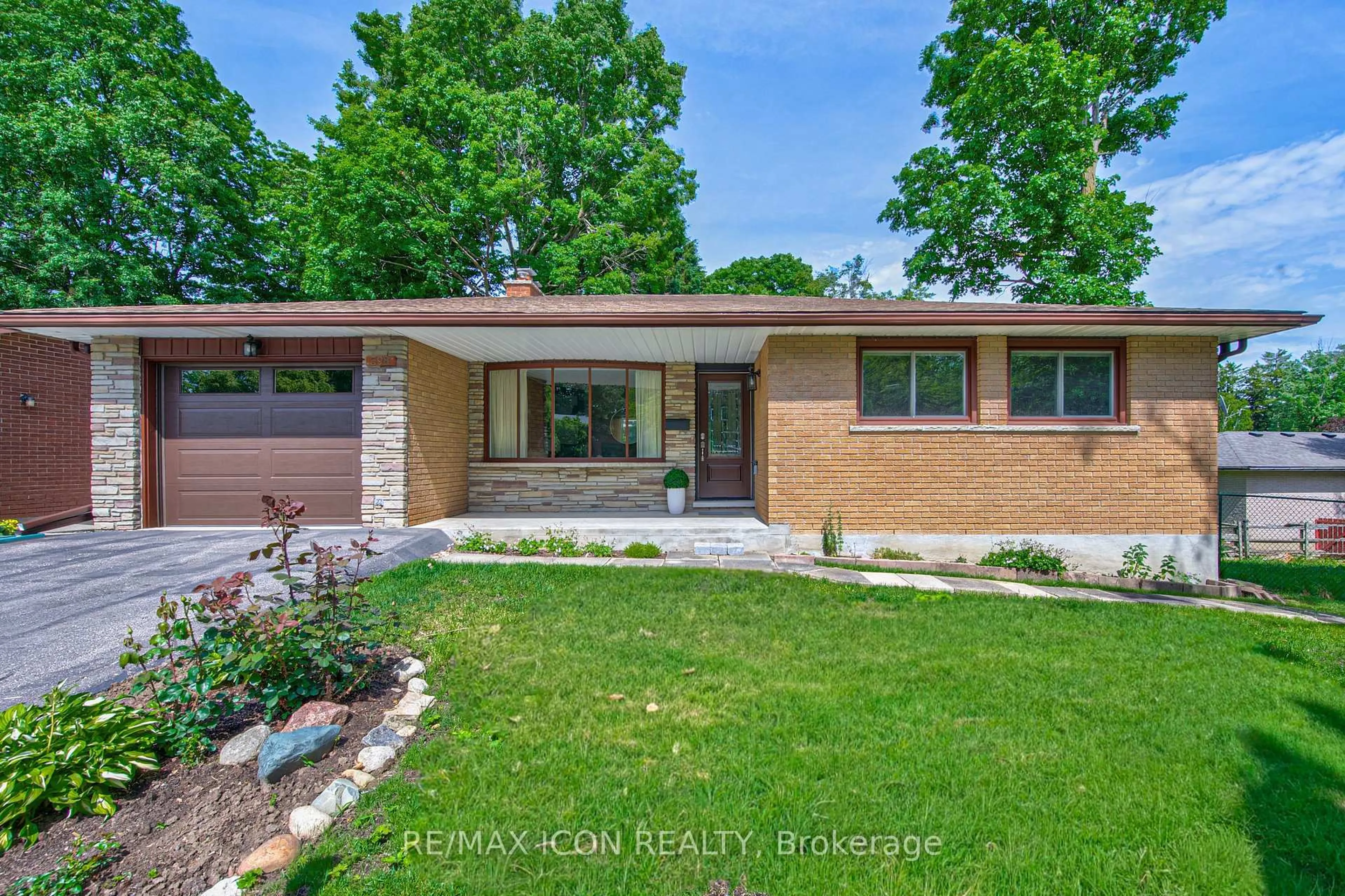 Home with brick exterior material, street for 598 Glen Forrest Blvd, Waterloo Ontario N2L 4J8