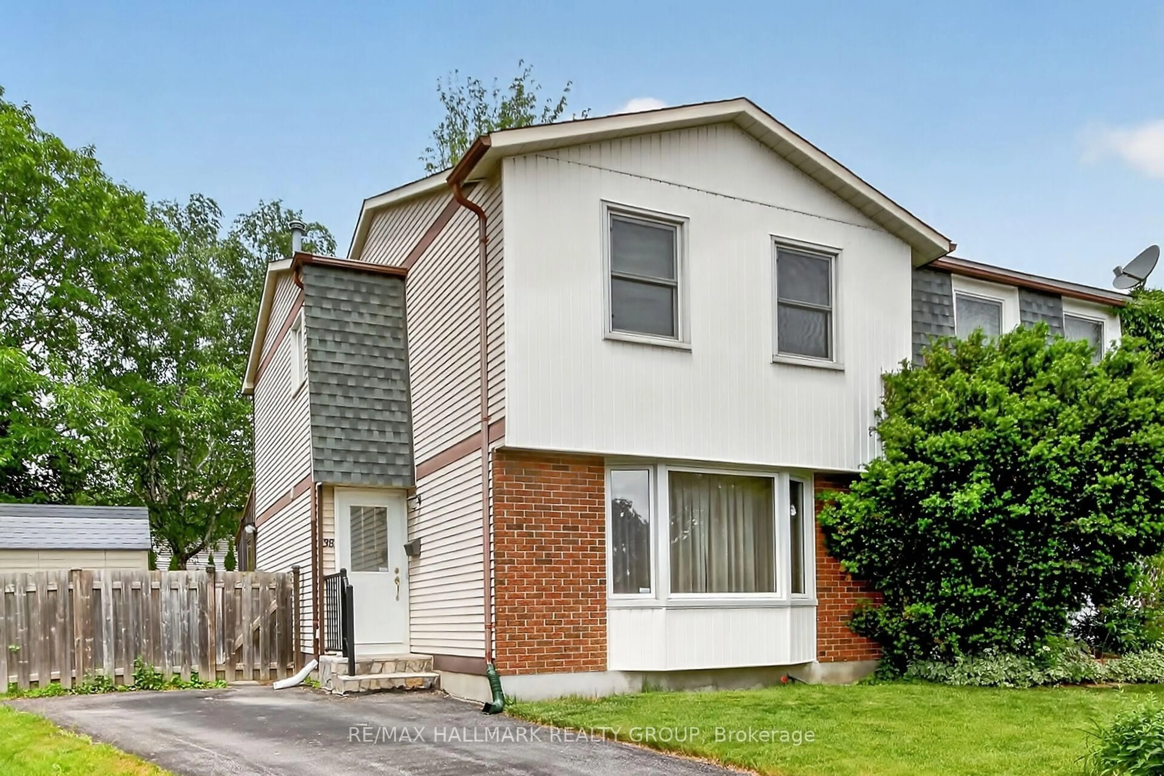 Home with brick exterior material, street for 38 Amherst Cres, Ottawa Ontario K2J 1V9