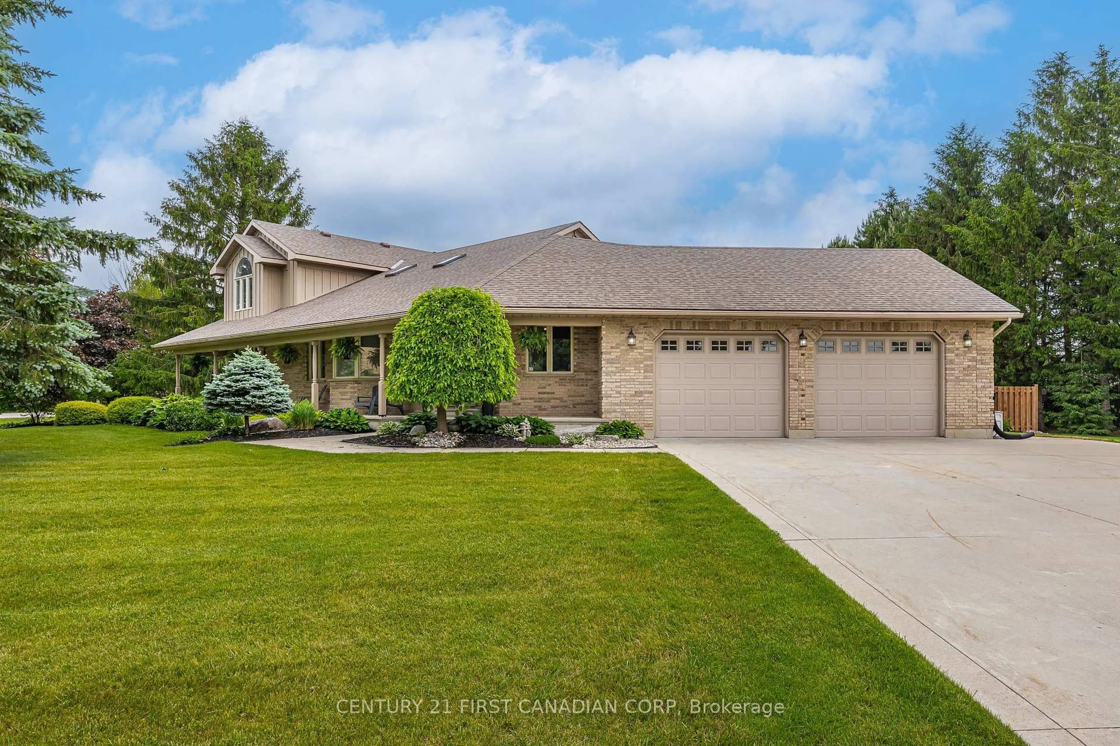 Home with vinyl exterior material, street for 35922 Lieury Rd, North Middlesex Ontario N0M 2K0