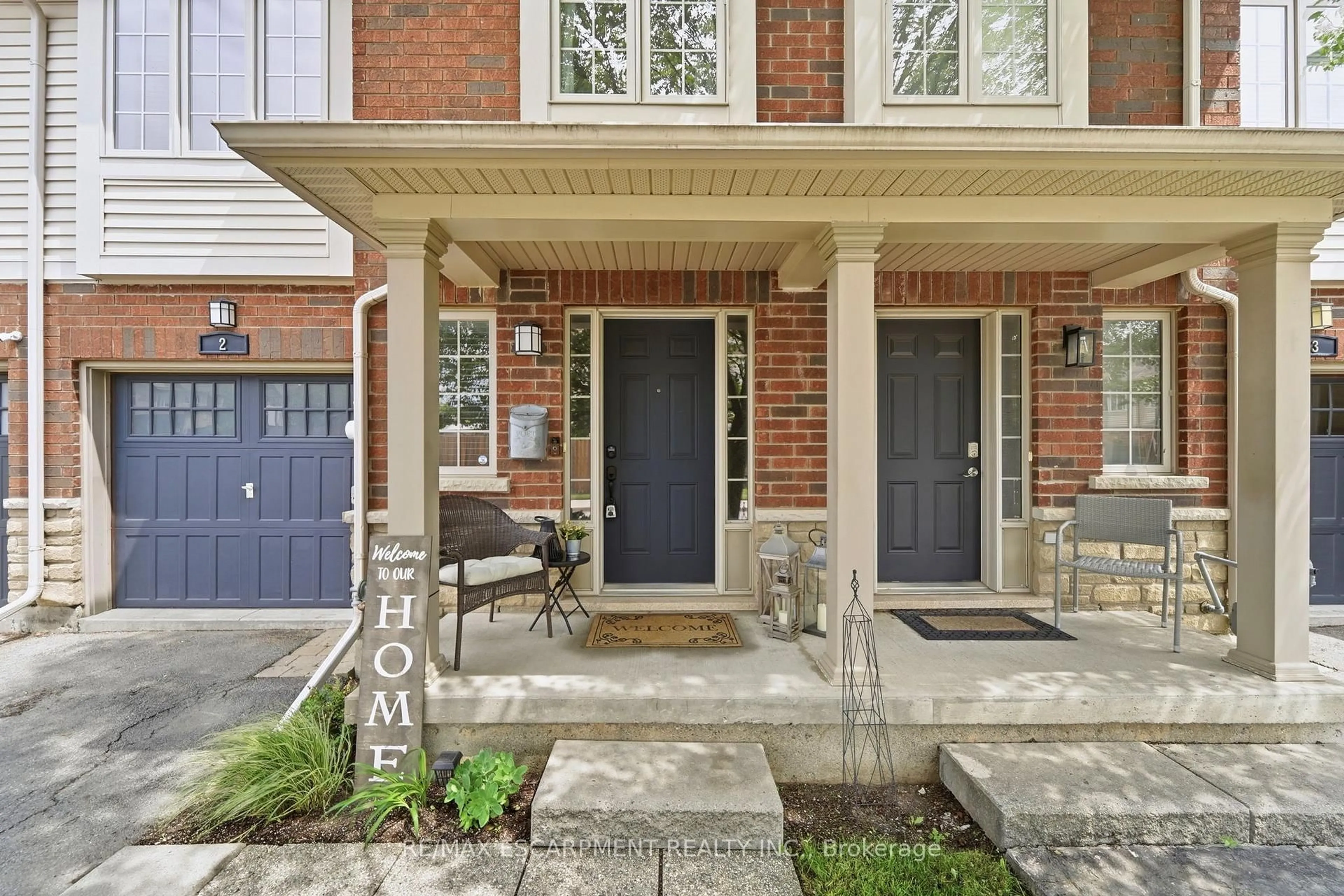 Home with brick exterior material, street for 222 Fall Fair Way #2, Hamilton Ontario L0R 1C0