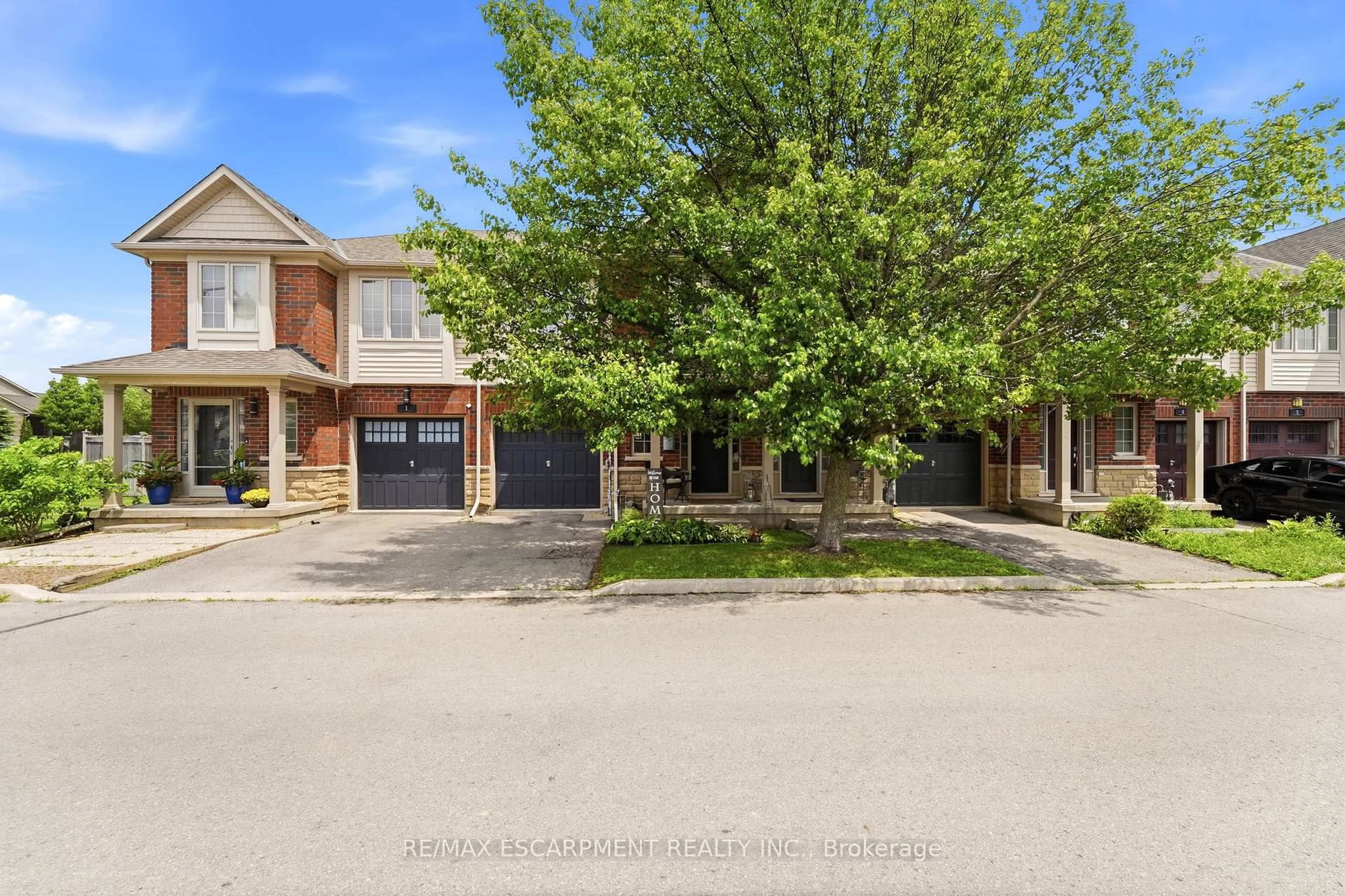 A pic from outside/outdoor area/front of a property/back of a property/a pic from drone, street for 222 Fall Fair Way #2, Hamilton Ontario L0R 1C0