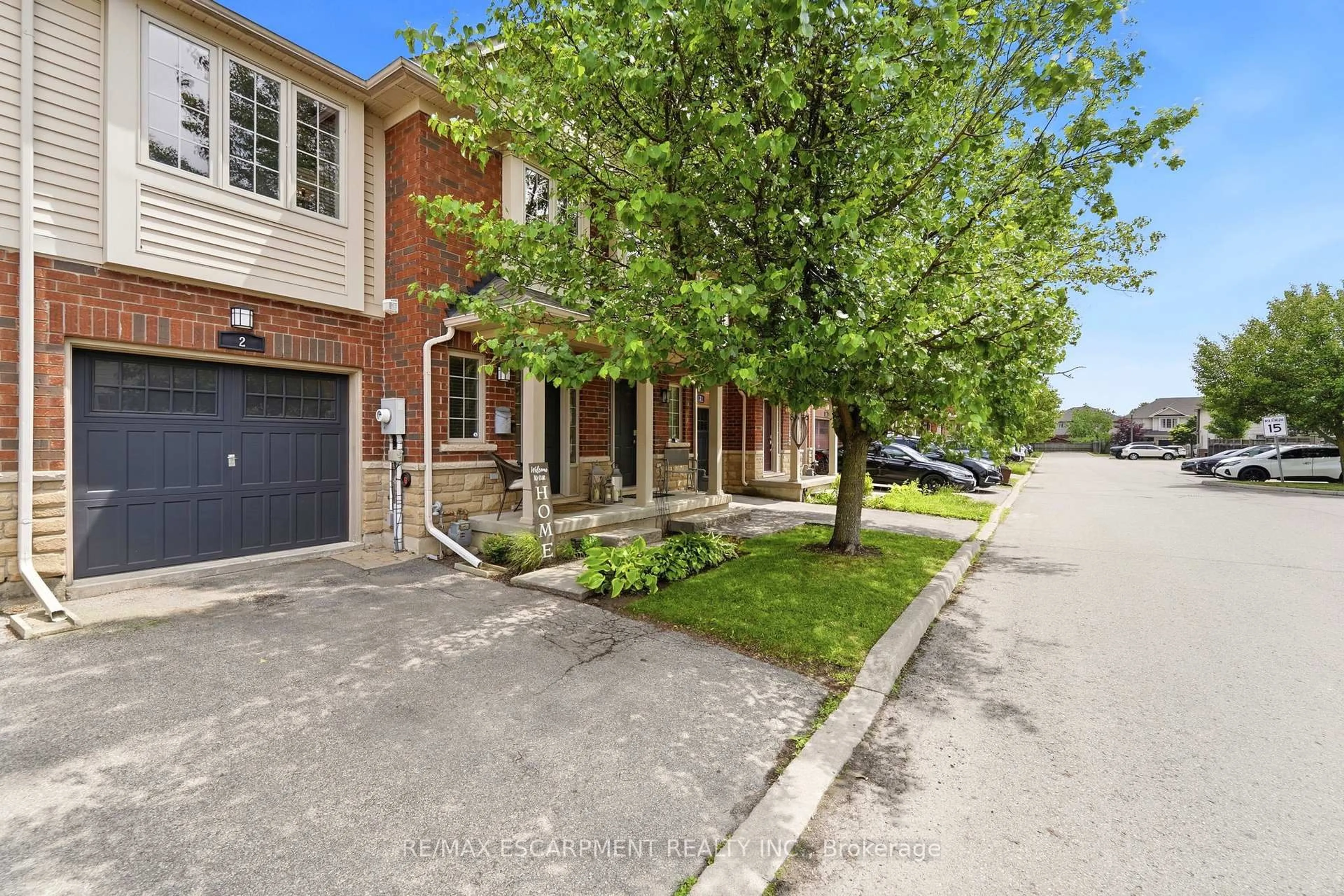 Home with brick exterior material, street for 222 Fall Fair Way #2, Hamilton Ontario L0R 1C0