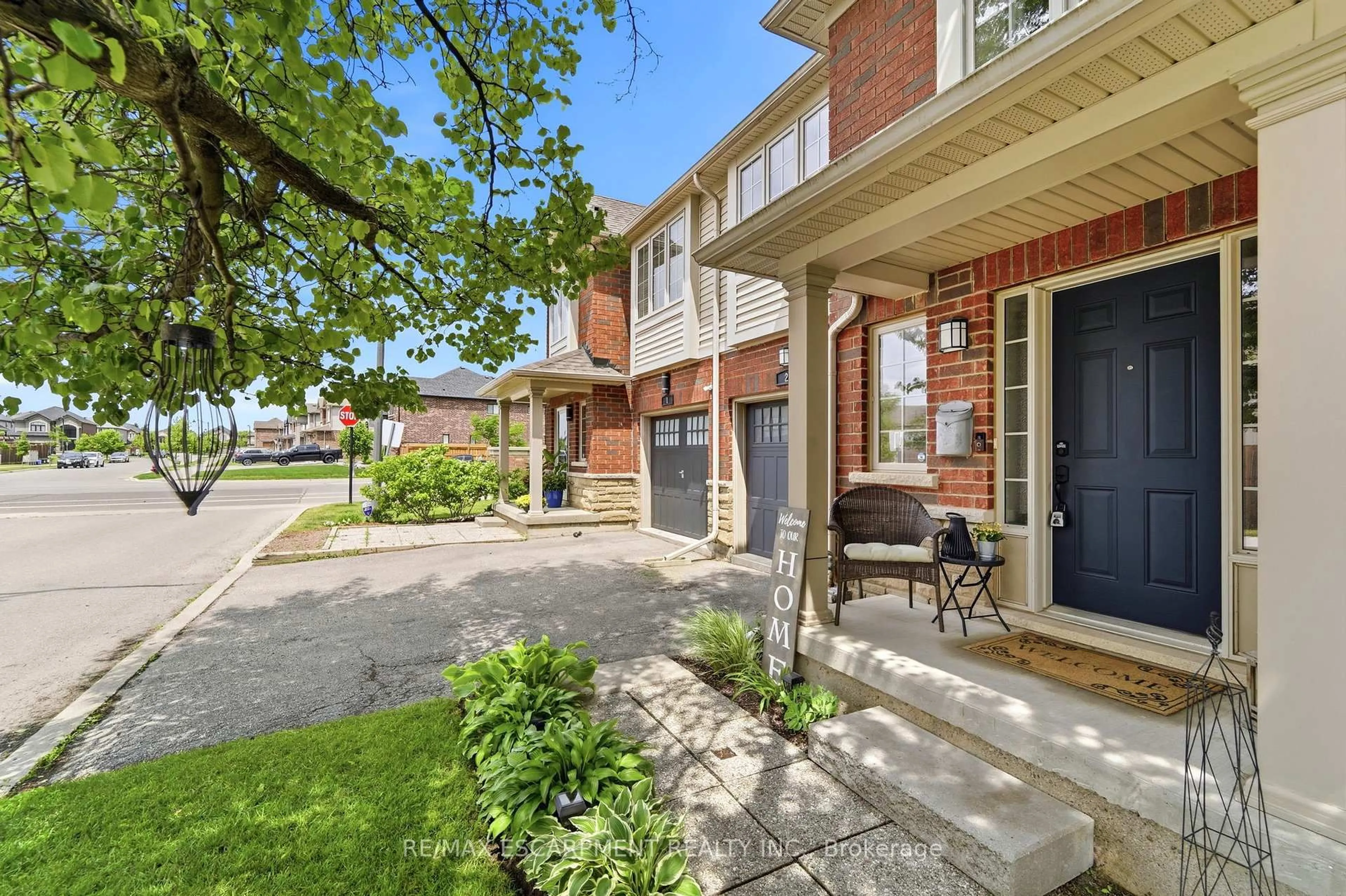 Home with brick exterior material, street for 222 Fall Fair Way #2, Hamilton Ontario L0R 1C0