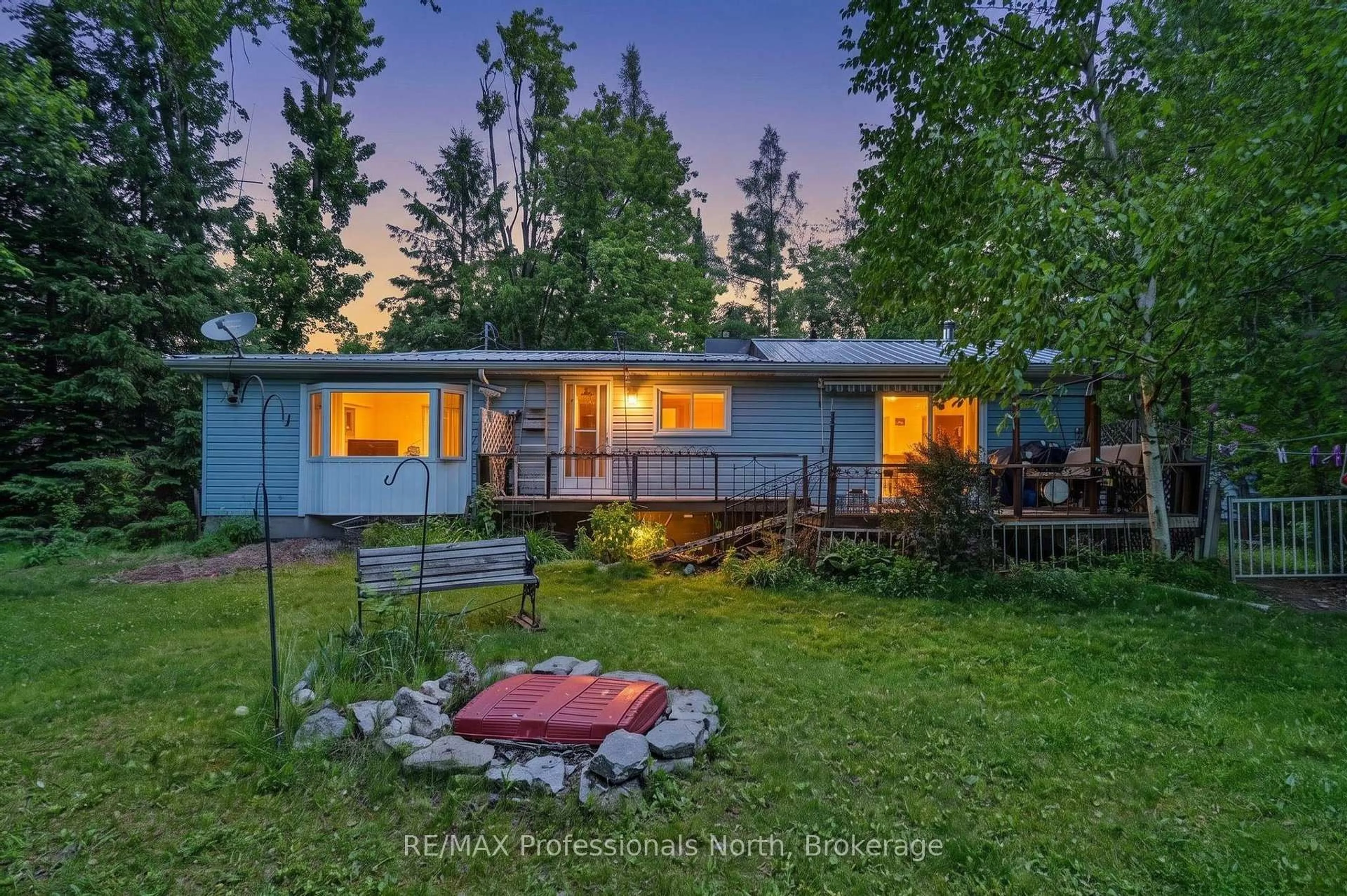 A pic from outside/outdoor area/front of a property/back of a property/a pic from drone, unknown for 18 Fire Route 104A, Trent Lakes Ontario K0M 1A0