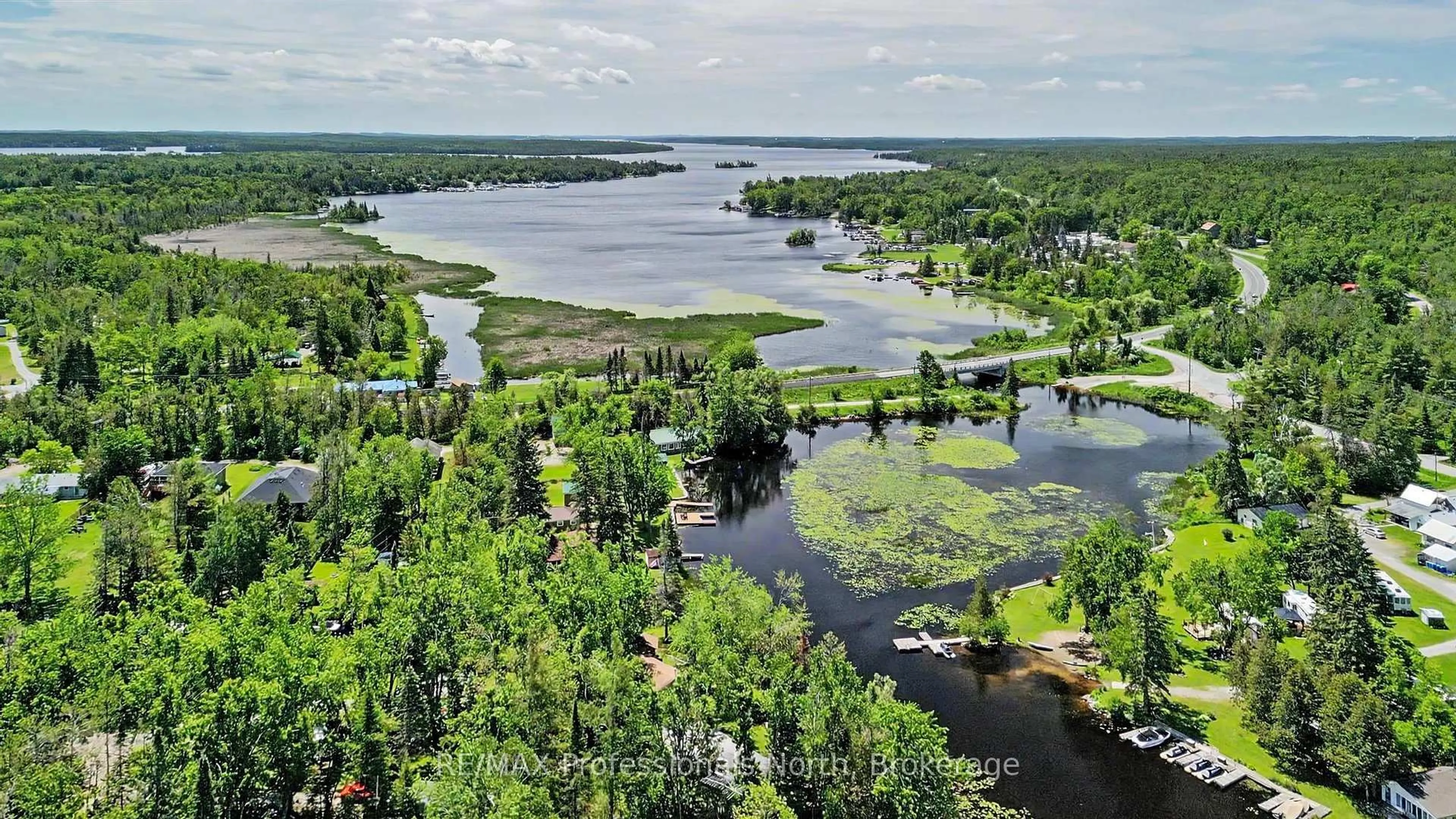 A pic from outside/outdoor area/front of a property/back of a property/a pic from drone, water/lake/river/ocean view for 18 Fire Route 104A, Trent Lakes Ontario K0M 1A0