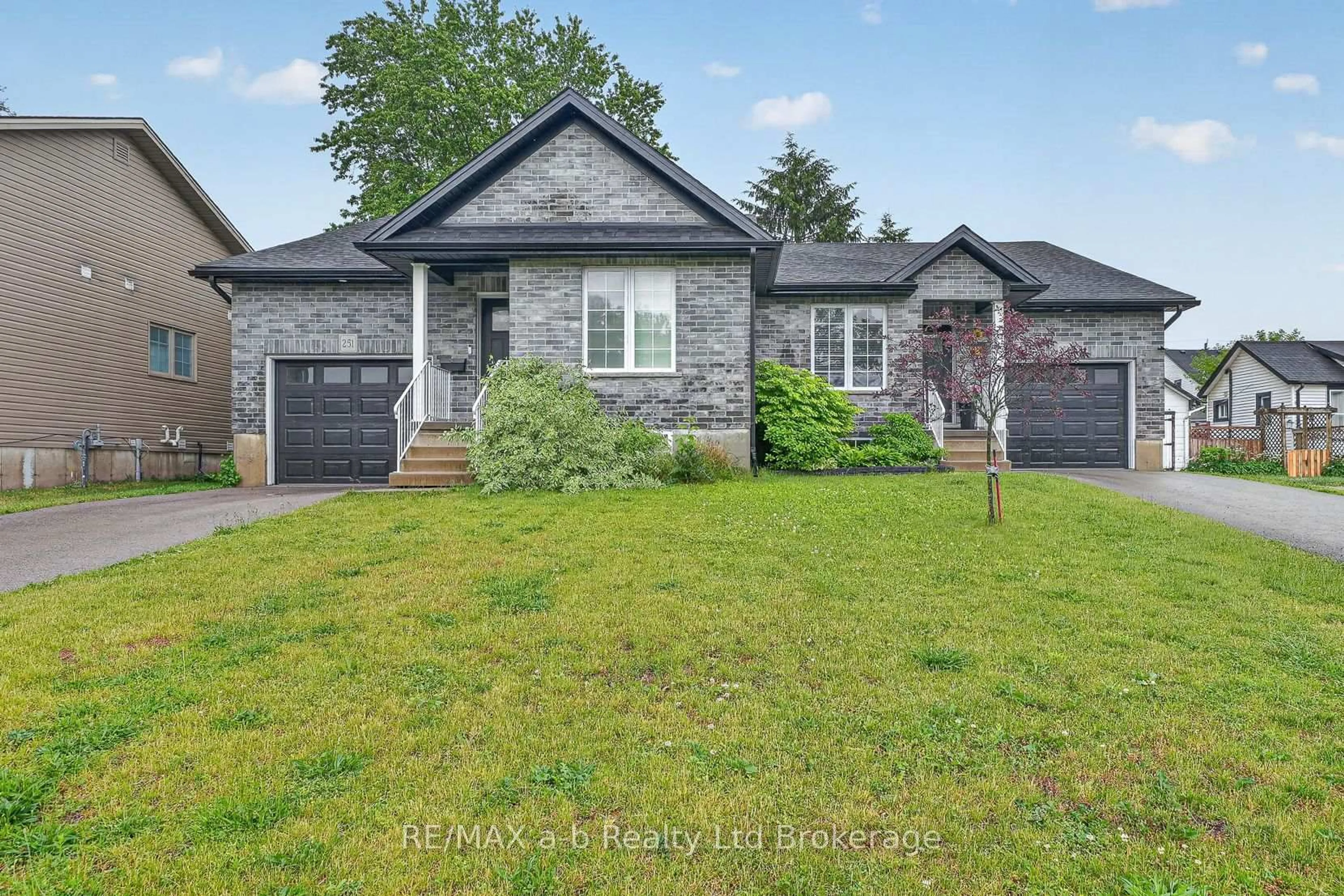 Home with brick exterior material, street for 253 Charles St, Ingersoll Ontario N5C 2M5