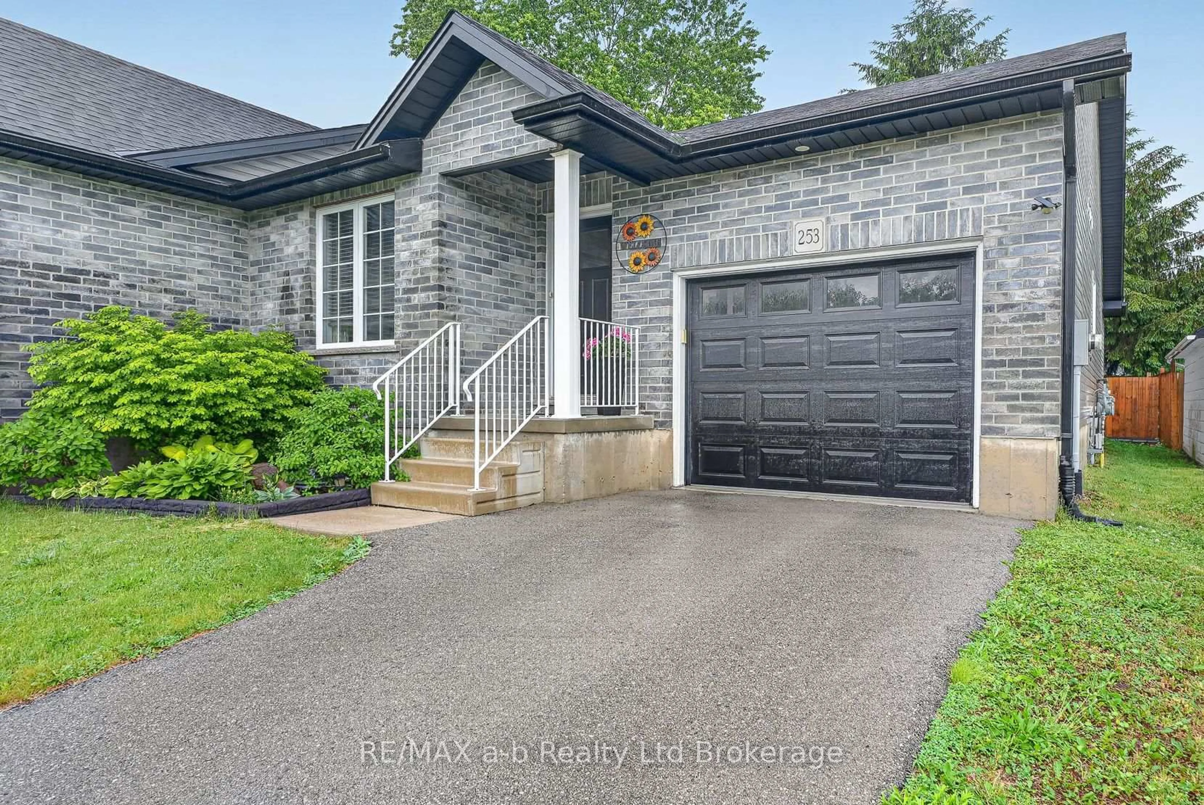 Home with brick exterior material, street for 253 Charles St, Ingersoll Ontario N5C 2M5