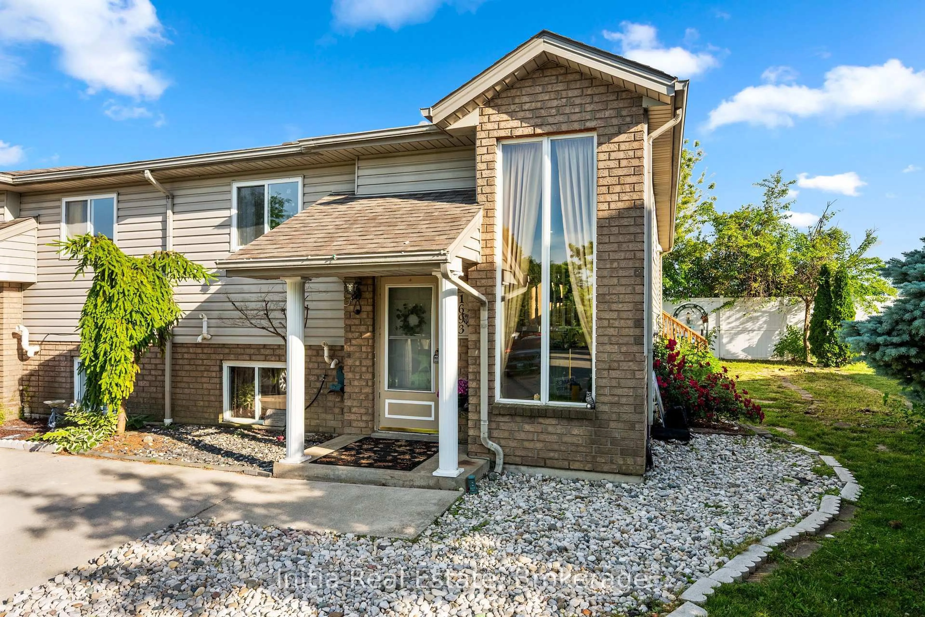 Home with brick exterior material, street for 1693 Fieldcrest Lane, Essex Ontario N8N 4Z8