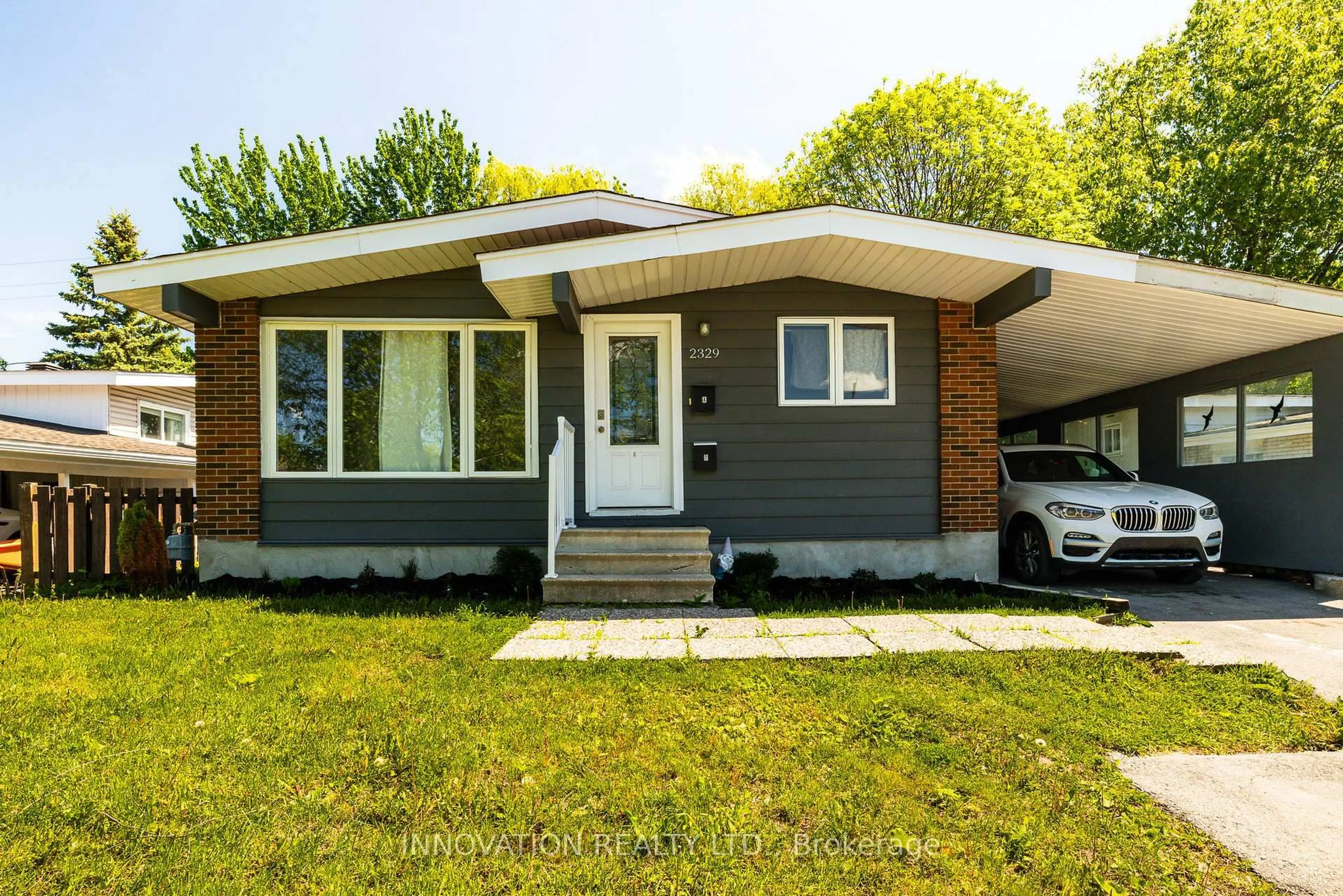 Home with vinyl exterior material, street for 2329 Ryder St, Ottawa Ontario K1H 6X4
