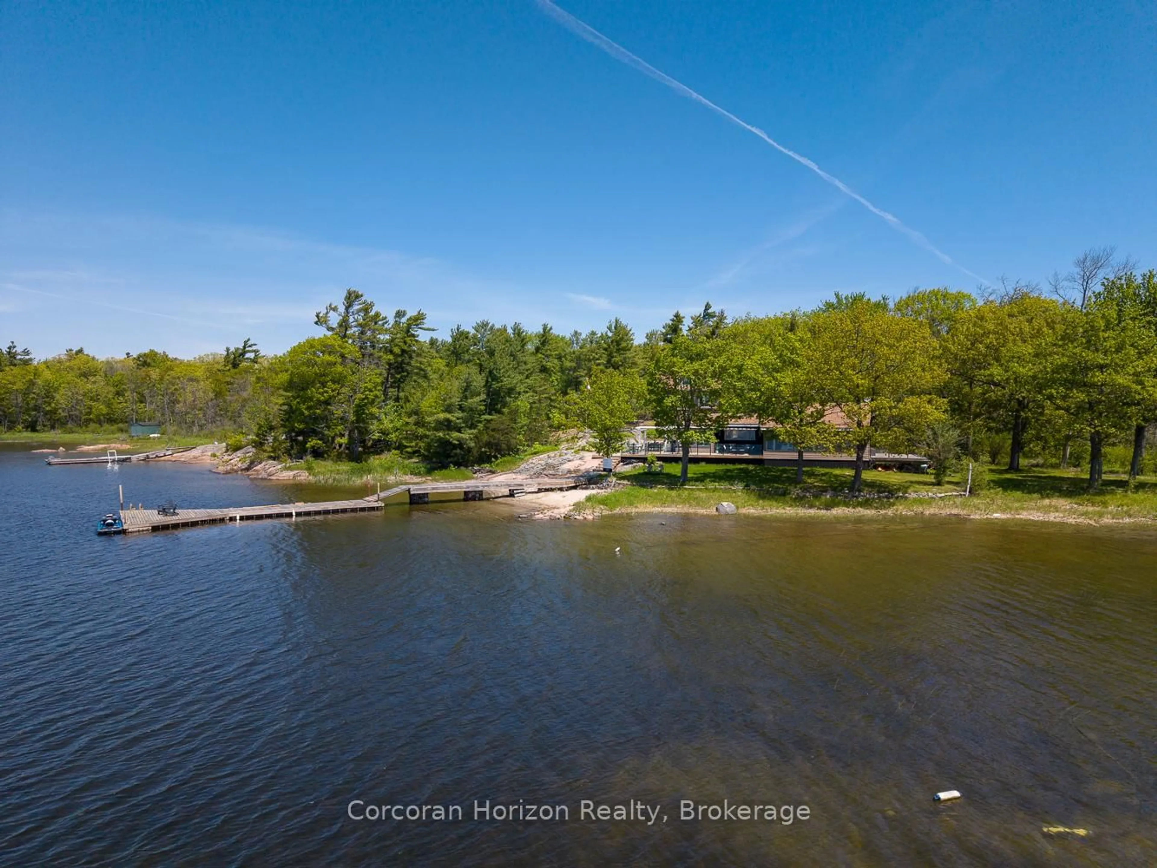 A pic from outside/outdoor area/front of a property/back of a property/a pic from drone, water/lake/river/ocean view for 4476 Island 1040/Little Beausoleil Island, Georgian Bay Ontario P0E 1E0