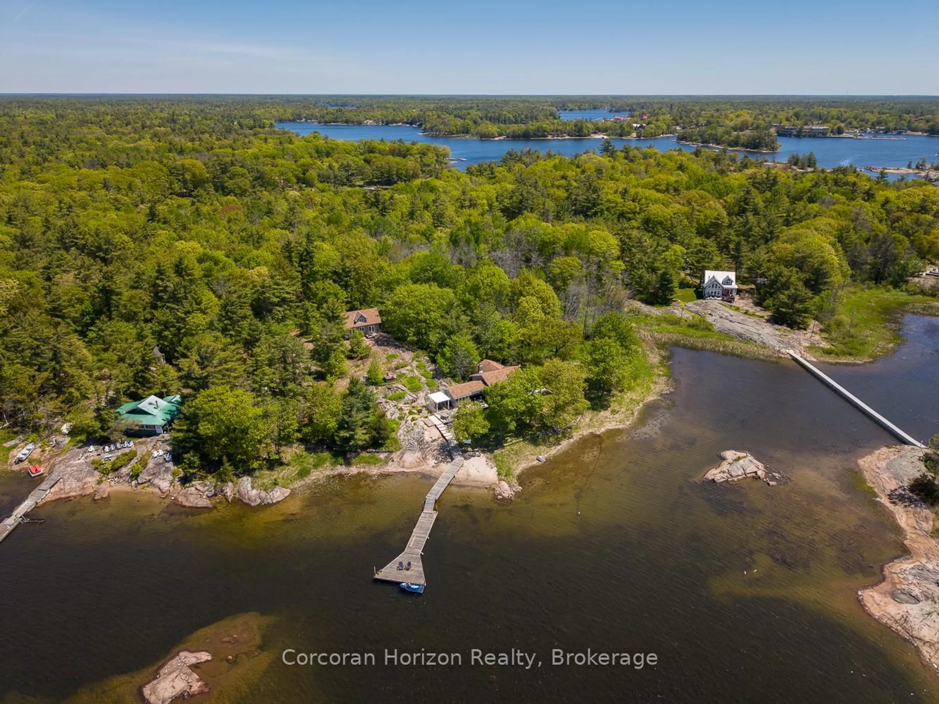 A pic from outside/outdoor area/front of a property/back of a property/a pic from drone, water/lake/river/ocean view for 4476 Island 1040/Little Beausoleil Island, Georgian Bay Ontario P0E 1E0