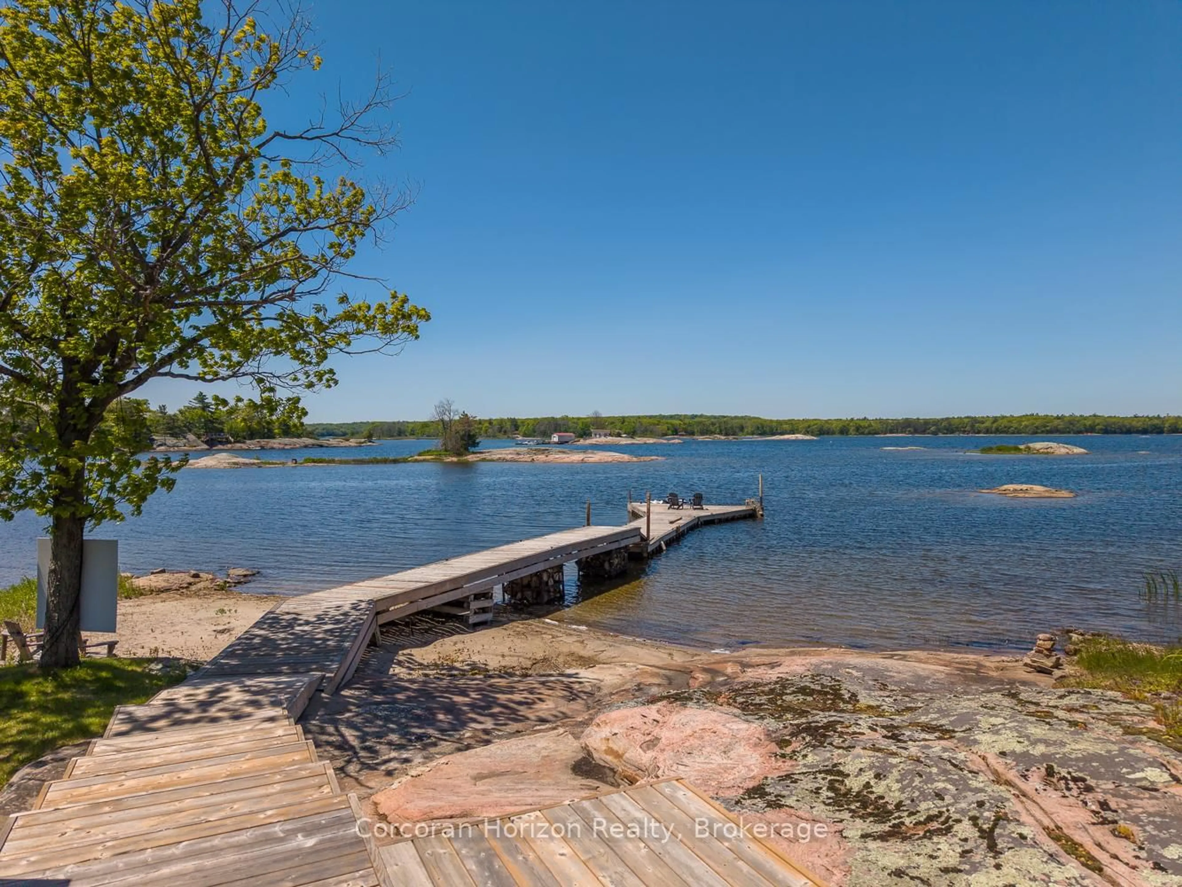 A pic from outside/outdoor area/front of a property/back of a property/a pic from drone, water/lake/river/ocean view for 4476 Island 1040/Little Beausoleil Island, Georgian Bay Ontario P0E 1E0