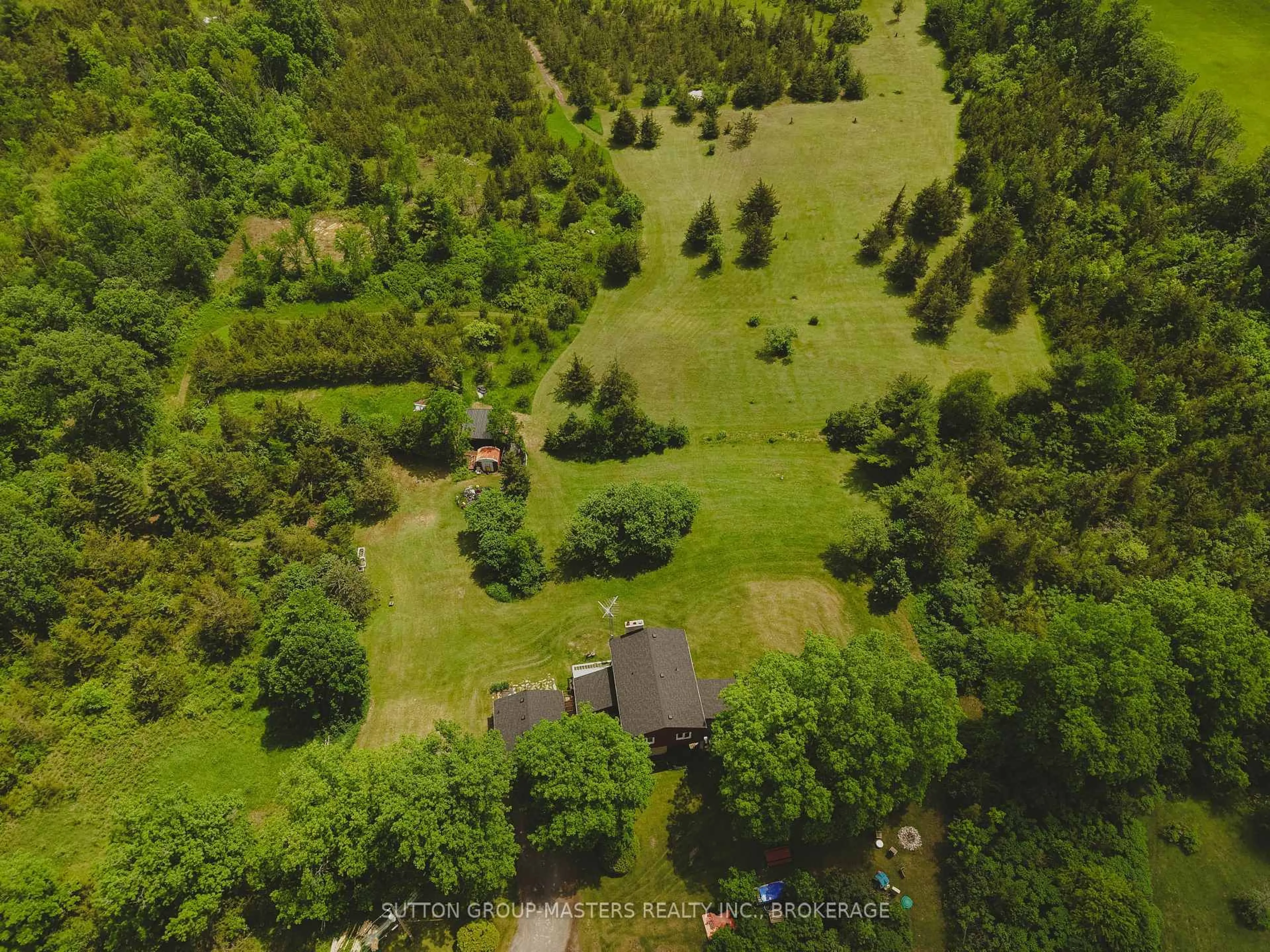 A pic from outside/outdoor area/front of a property/back of a property/a pic from drone, forest/trees view for 4374 County Road 1, Yarker Ontario K0K 3N0
