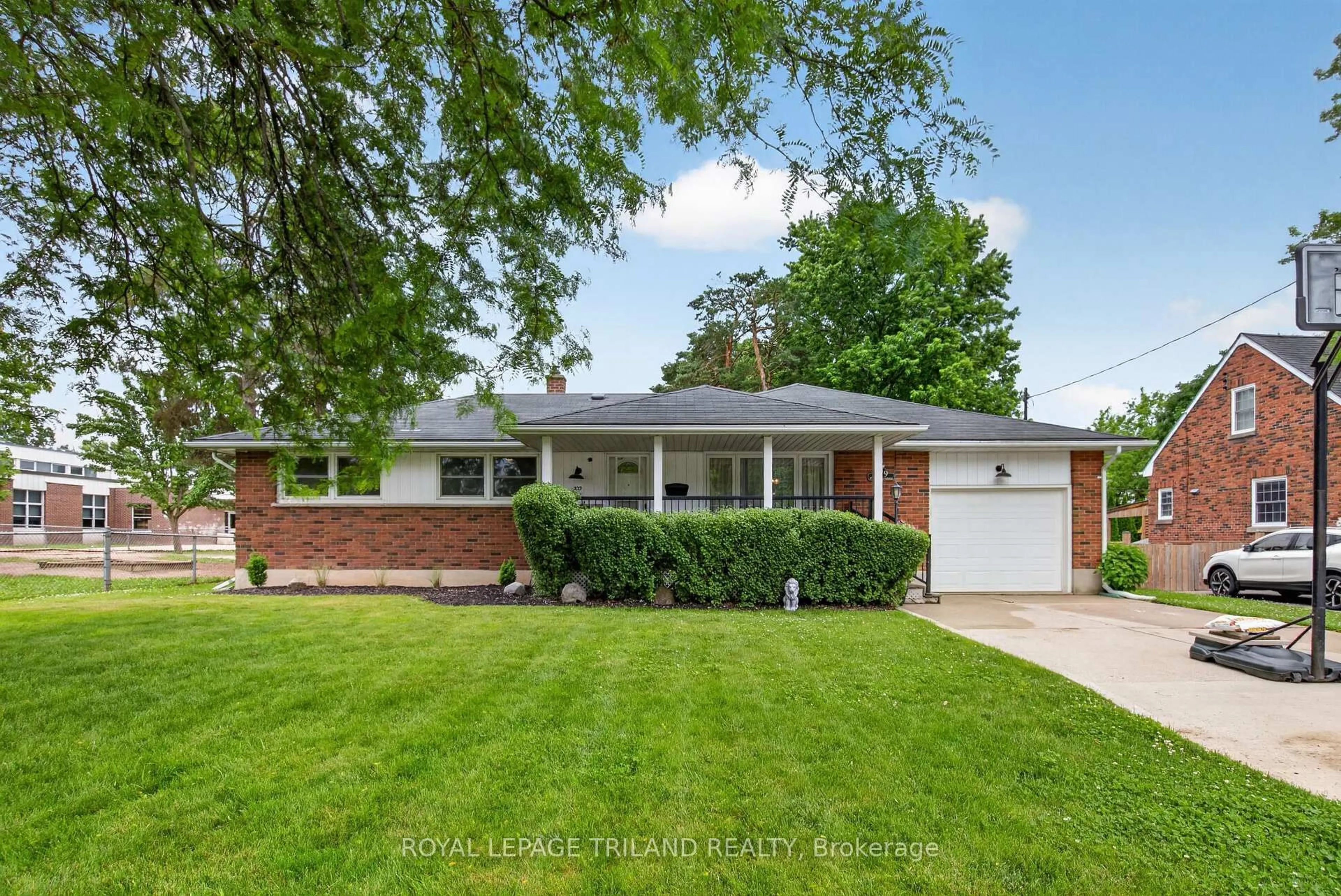 Home with brick exterior material, street for 279 Forest Ave, St. Thomas Ontario N5R 2K5