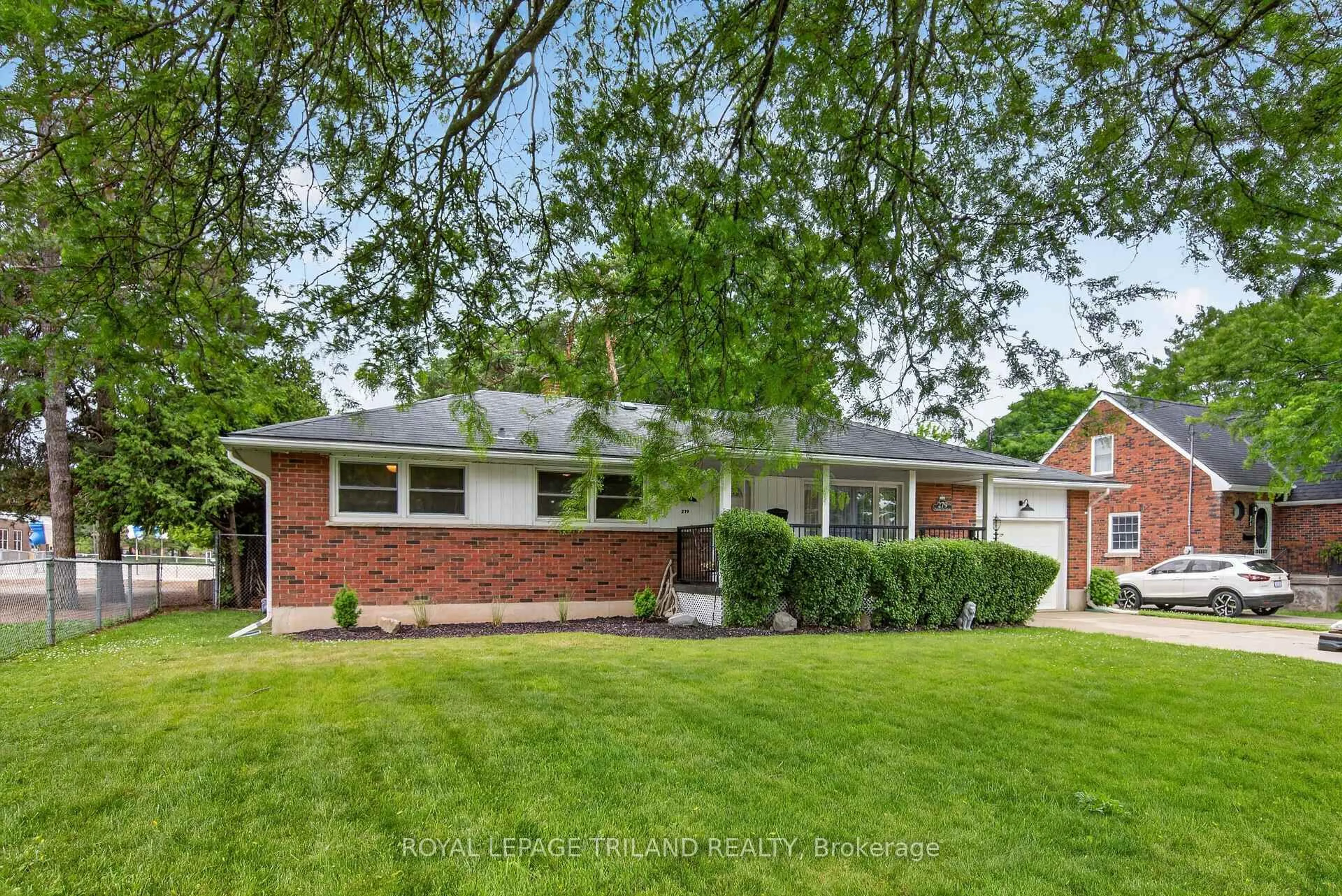 Home with brick exterior material, street for 279 Forest Ave, St. Thomas Ontario N5R 2K5