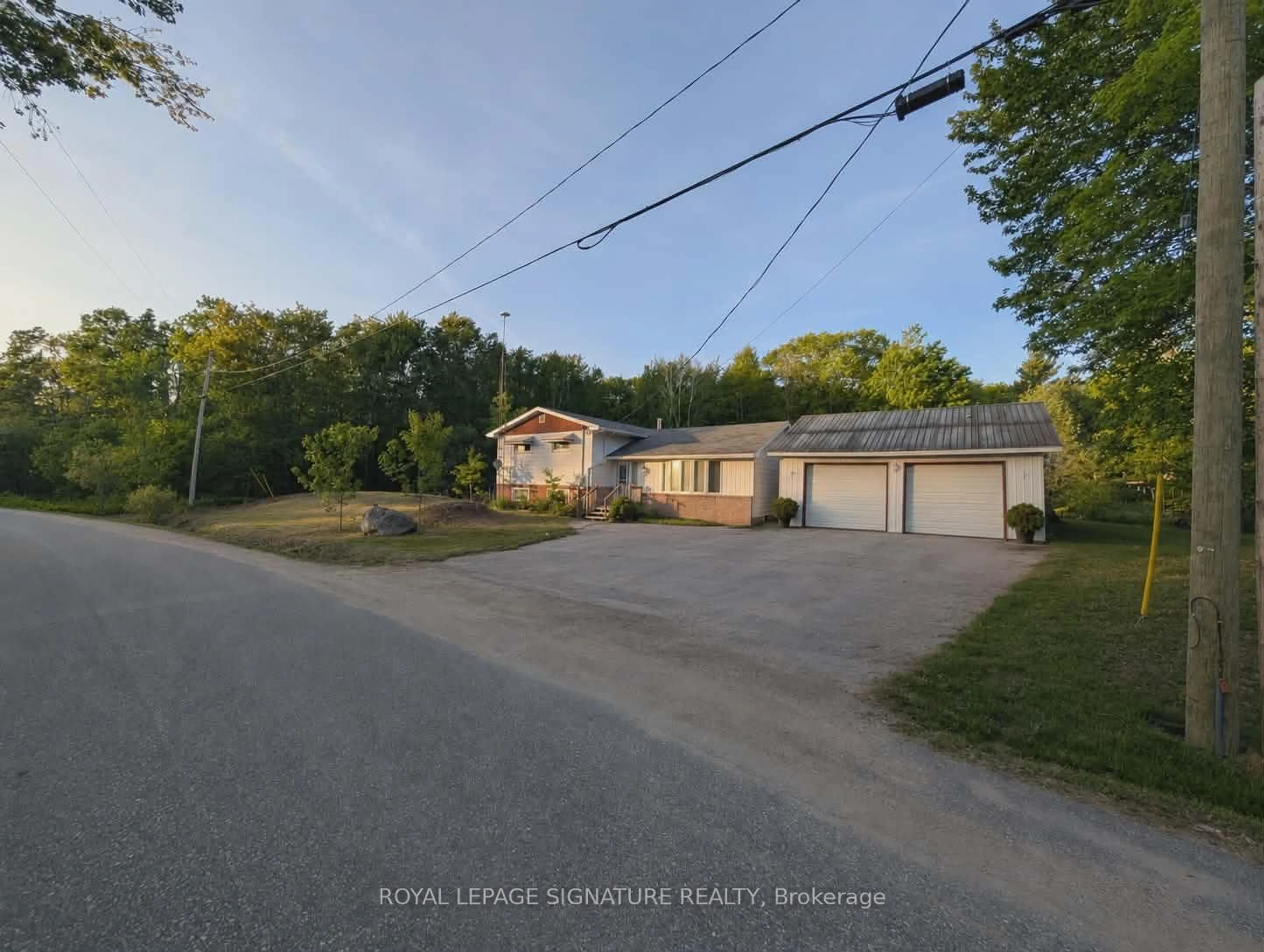 A pic from outside/outdoor area/front of a property/back of a property/a pic from drone, street for 1034 Buckeye Rd, Muskoka Lakes Ontario P0C 1H0