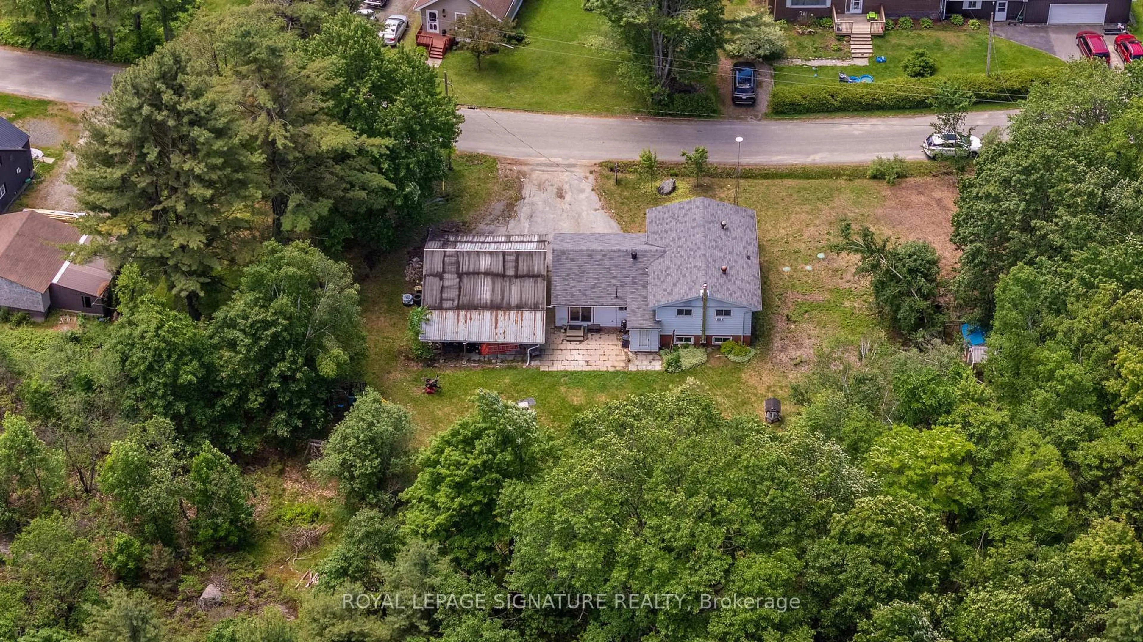 A pic from outside/outdoor area/front of a property/back of a property/a pic from drone, unknown for 1034 Buckeye Rd, Muskoka Lakes Ontario P0C 1H0